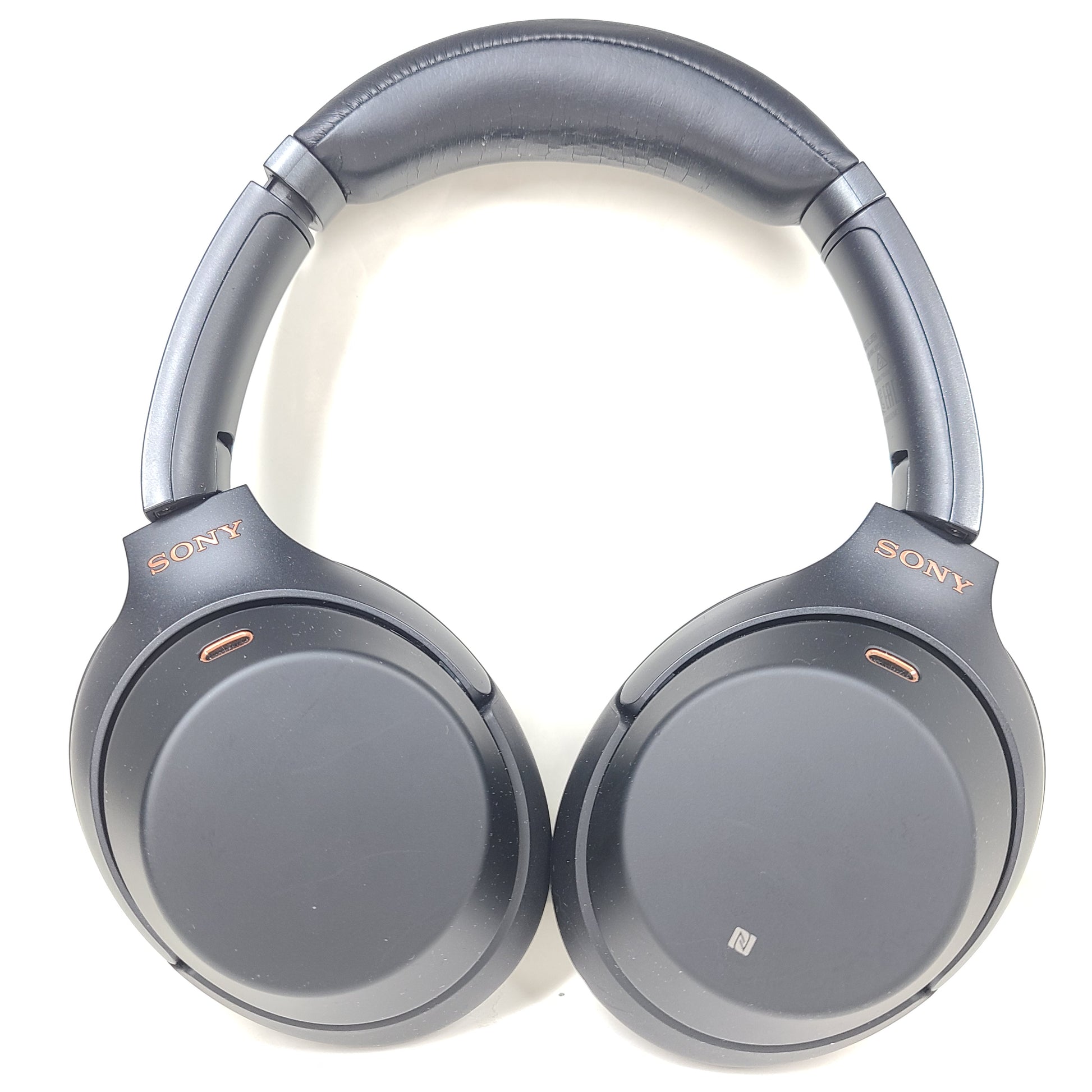 Black Sony WH-1000XM3 wireless over-ear headphones with active noise cancellation and cushioned ear pads for extended comfort.