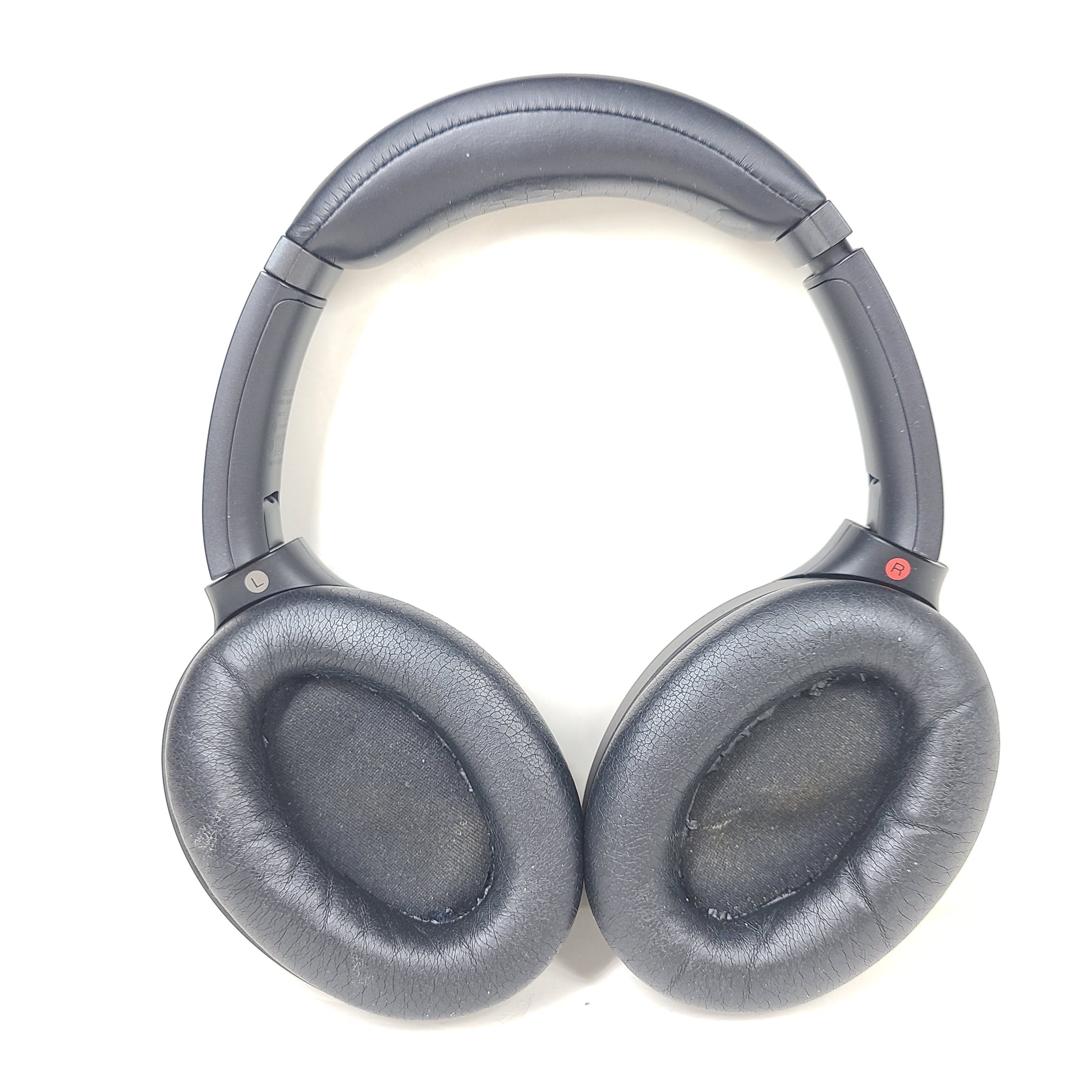 Black Sony WH-1000XM3 wireless over-ear headphones with active noise cancellation and cushioned ear pads for extended comfort.