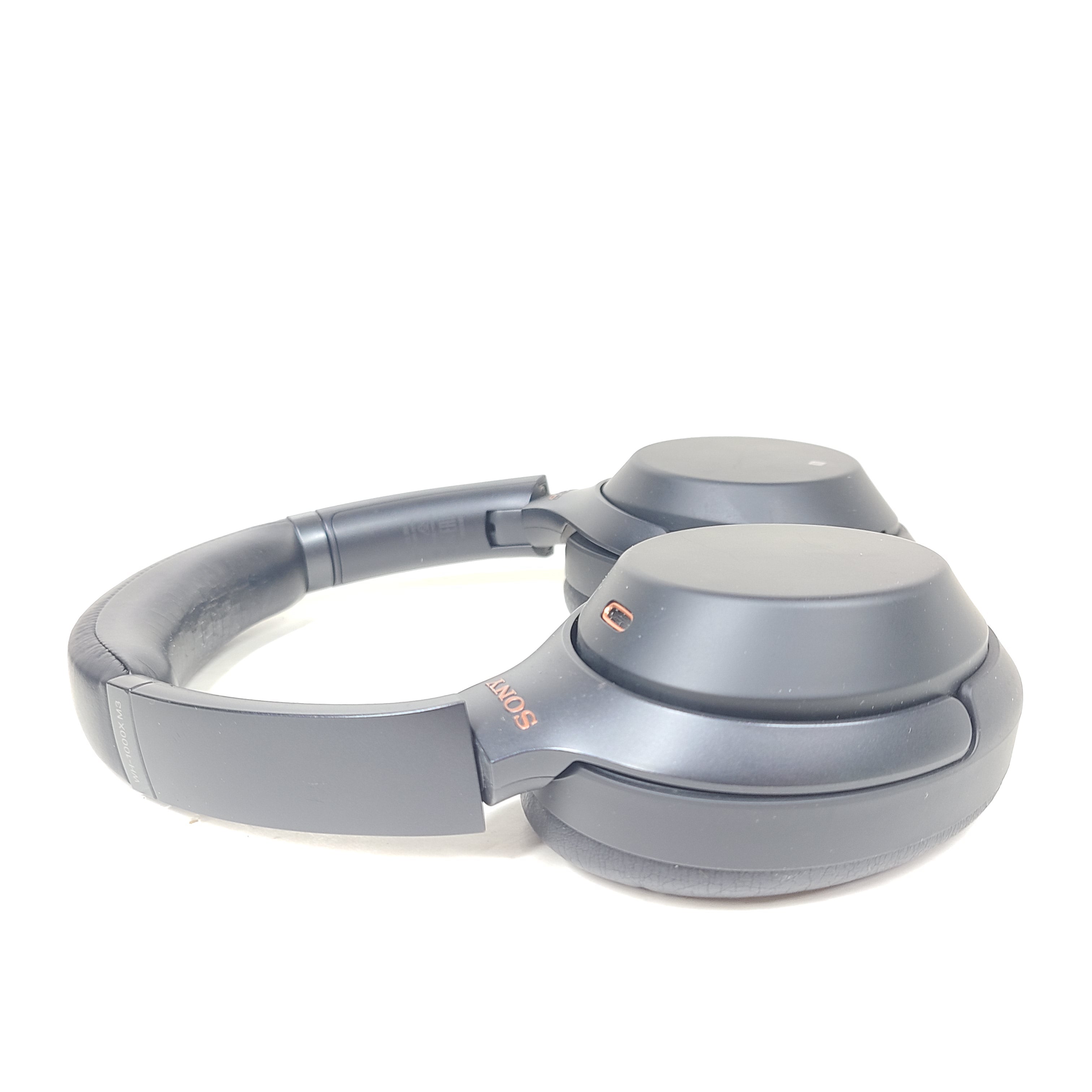 Black Sony WH-1000XM3 wireless over-ear headphones with active noise cancellation and cushioned ear pads for extended comfort.