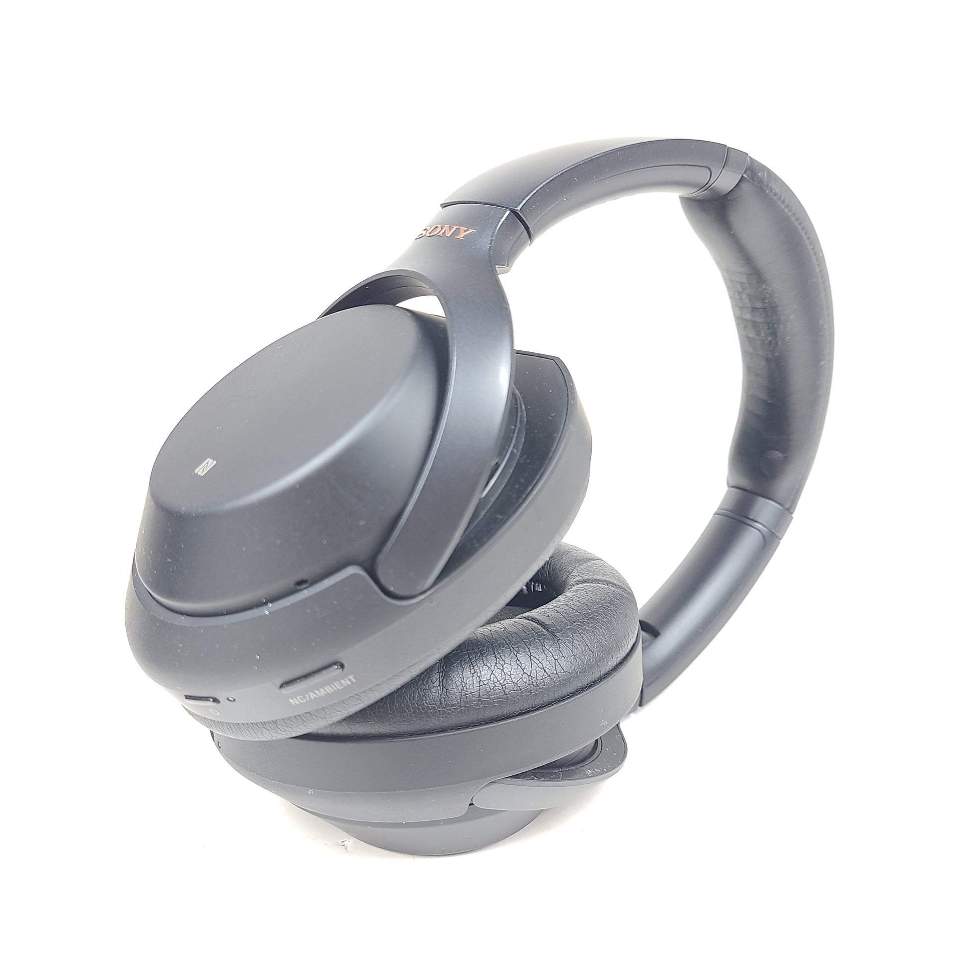 Black Sony WH-1000XM3 wireless over-ear headphones with active noise cancellation and cushioned ear pads for extended comfort.