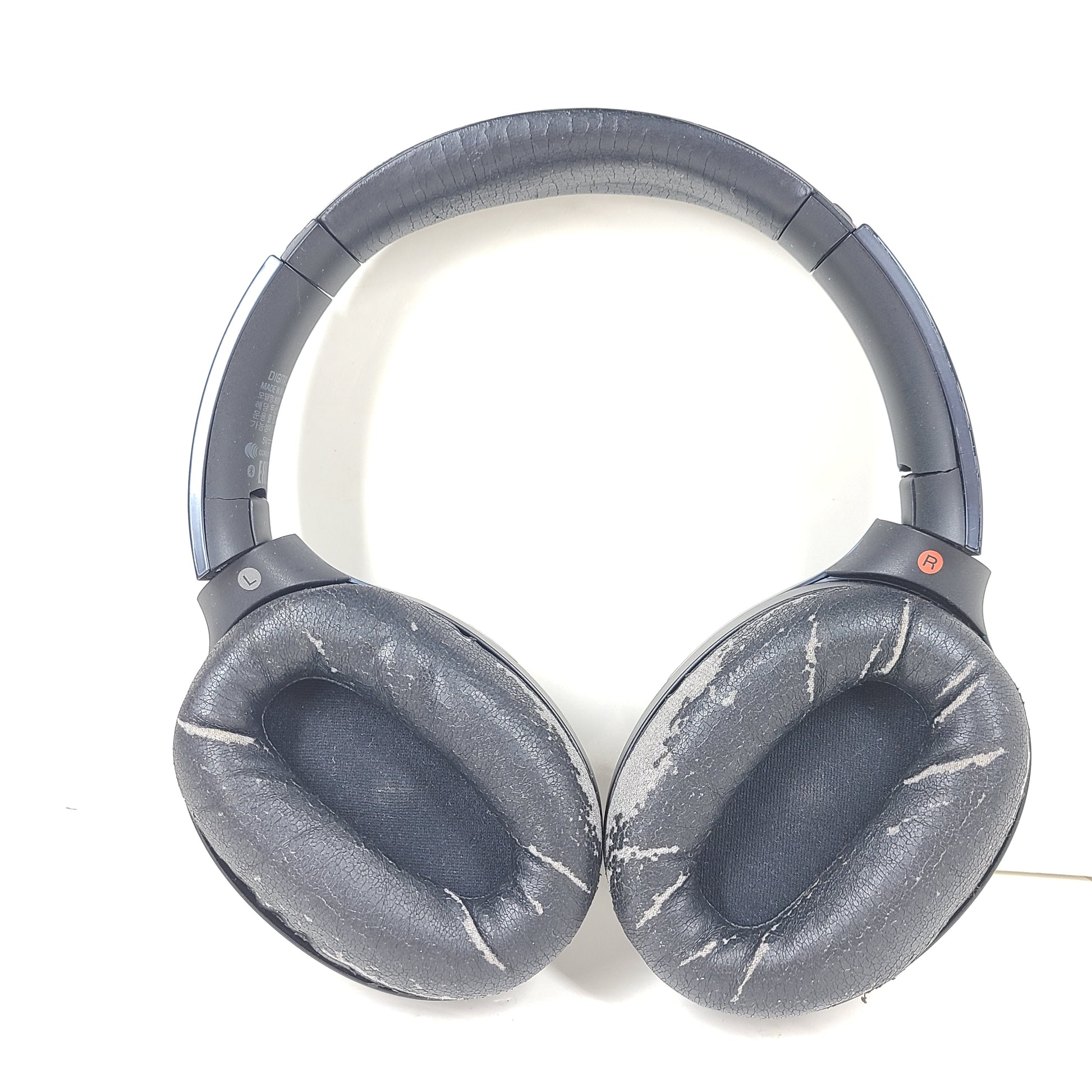 Over-ear Sony MDR-1000X headphones with active noise cancellation and a black finish.
