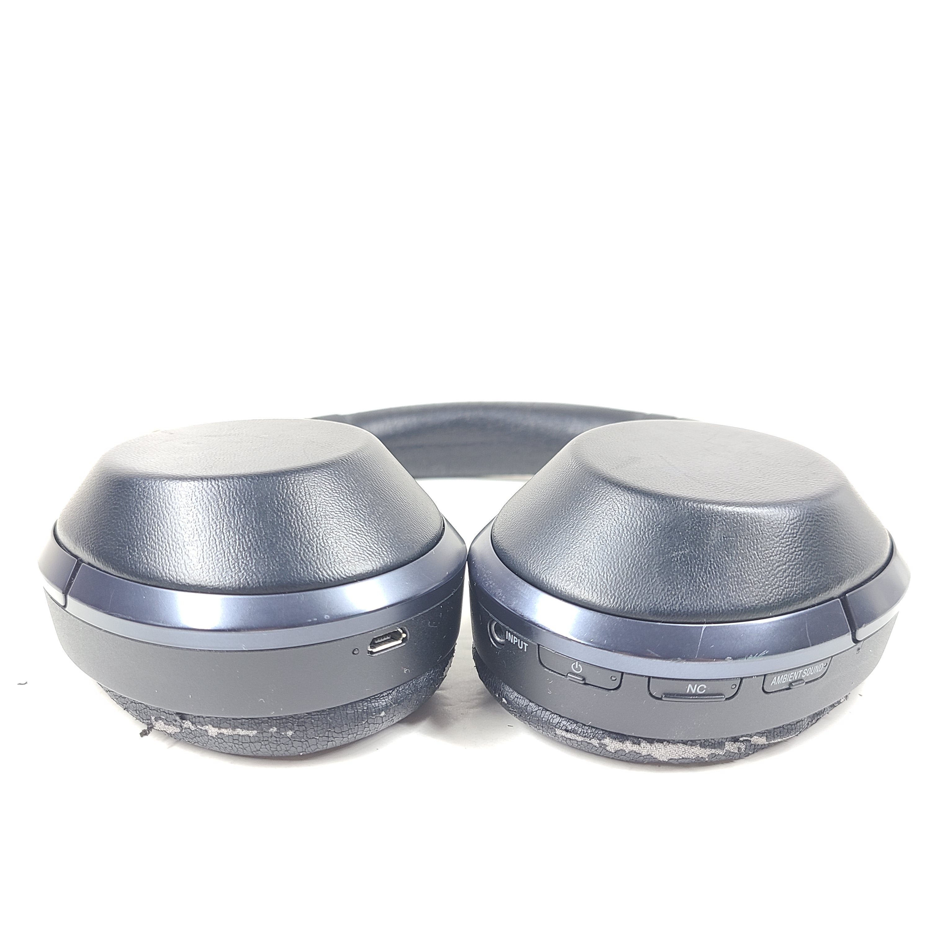 Over-ear Sony MDR-1000X headphones with active noise cancellation and a black finish.
