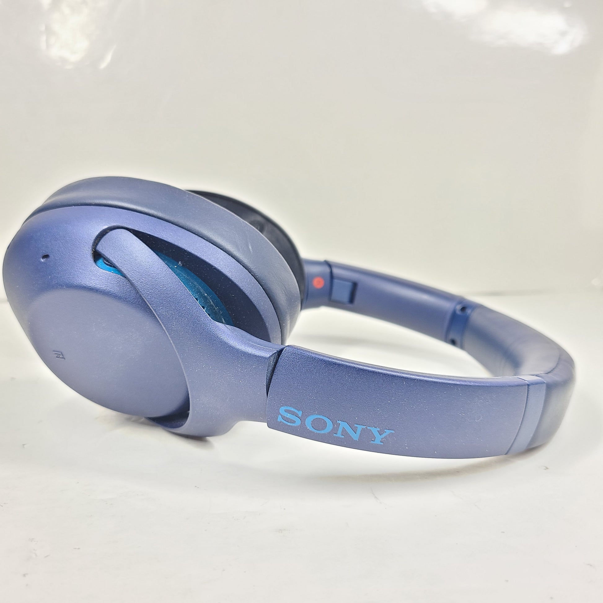 Over-ear Sony WH-XB900N wireless headphones in blue with active noise cancellation and emphasized bass.