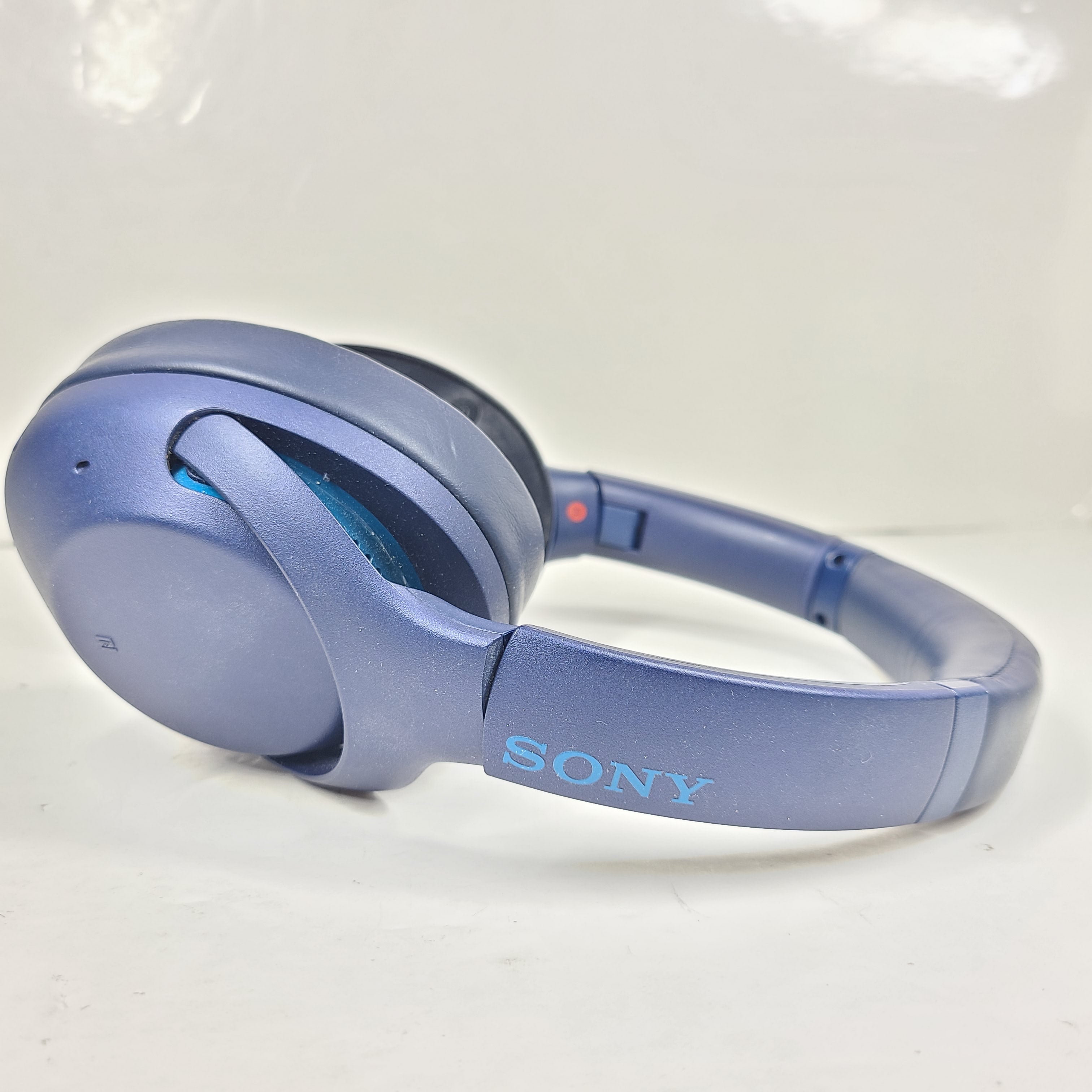 Over-ear Sony WH-XB900N wireless headphones in blue with active noise cancellation and emphasized bass.