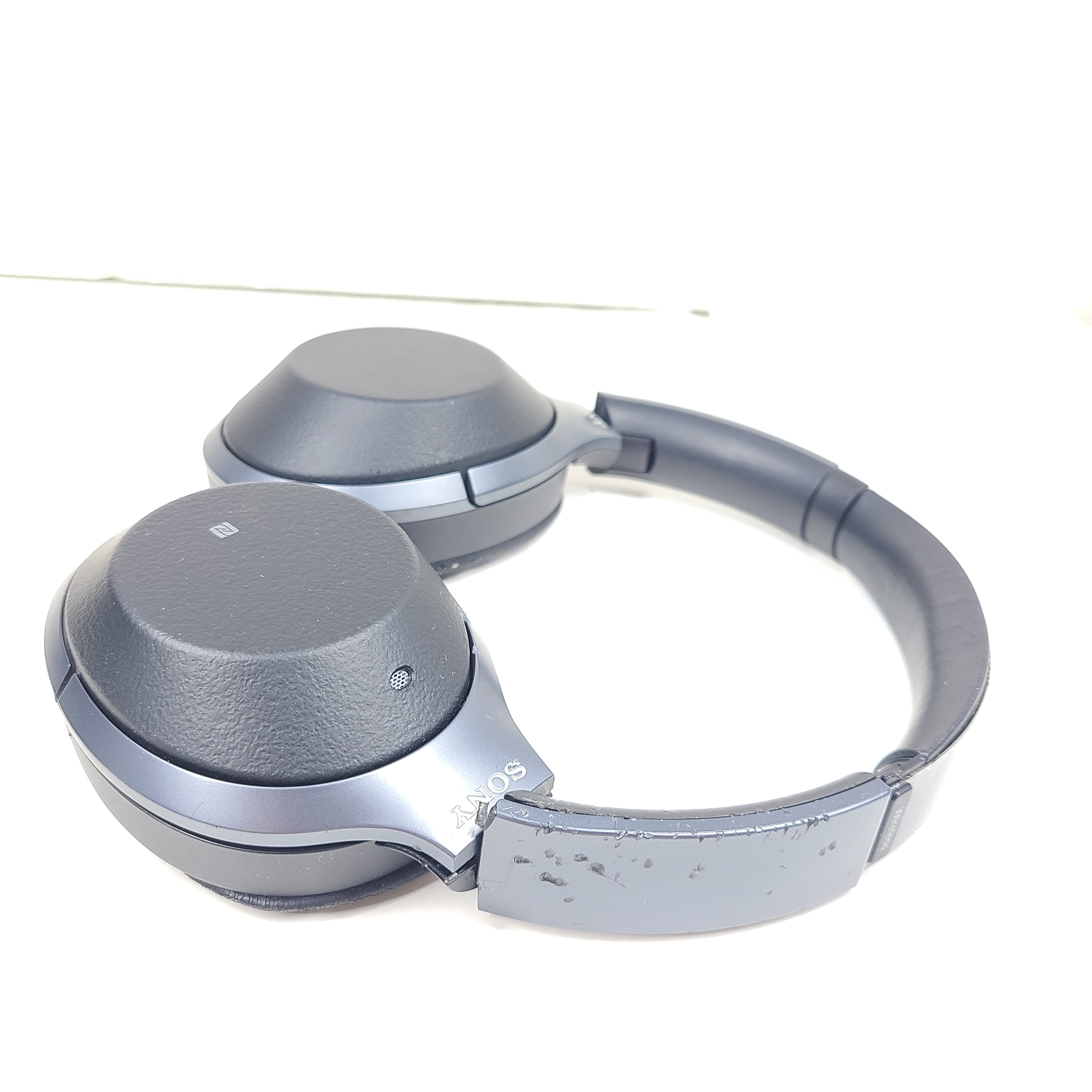 Black Sony WH-H900N wireless noise-cancelling headphones with cushioned ear pads and headband design.