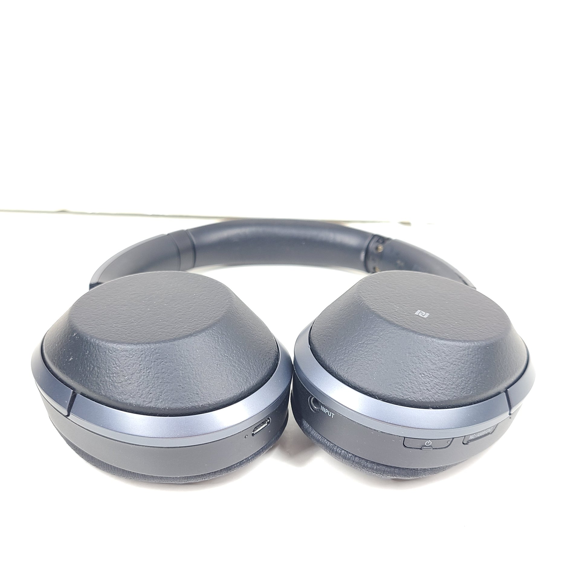 Black Sony WH-H900N wireless noise-cancelling headphones with cushioned ear pads and headband design.