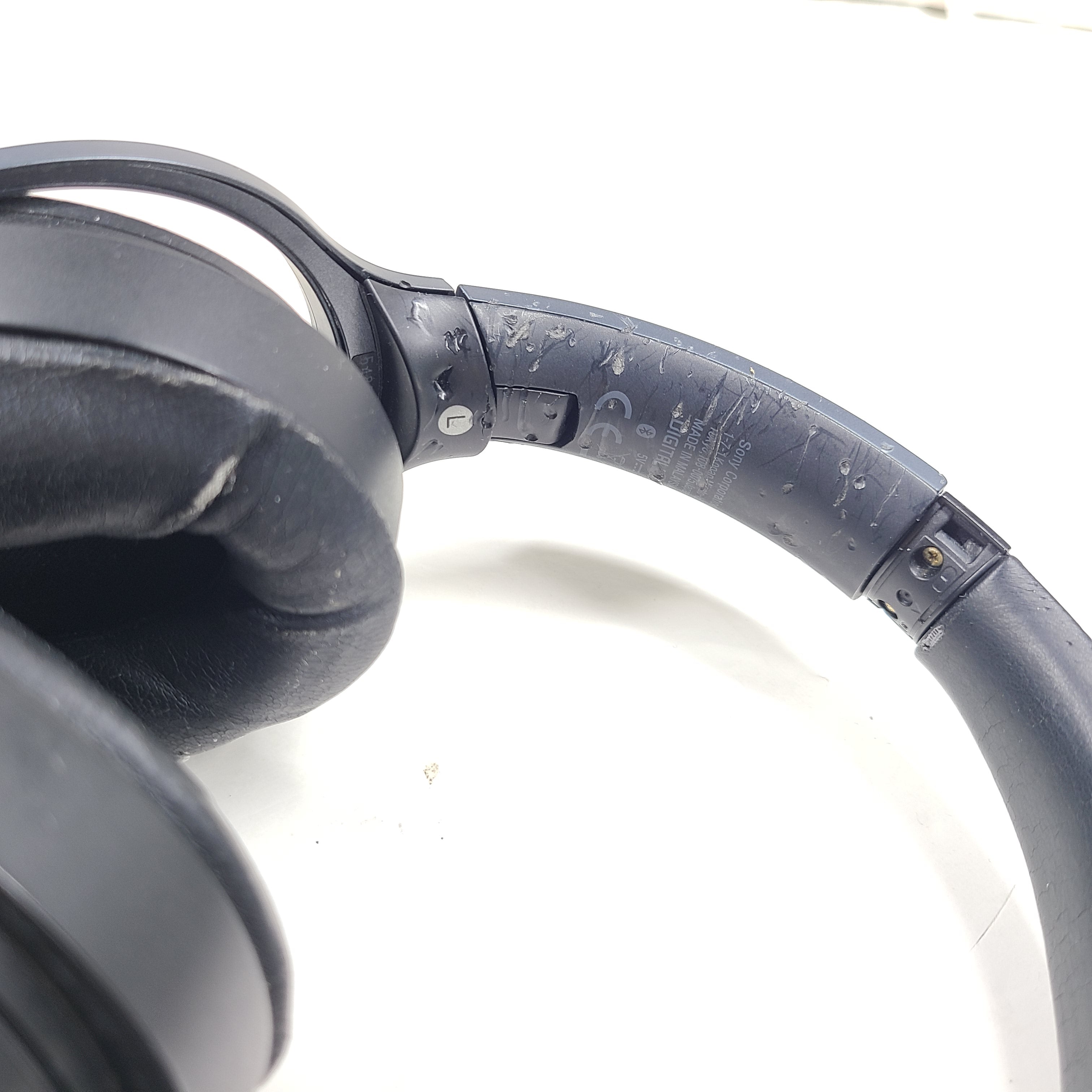 Black Sony WH-H900N wireless noise-cancelling headphones with cushioned ear pads and headband design.