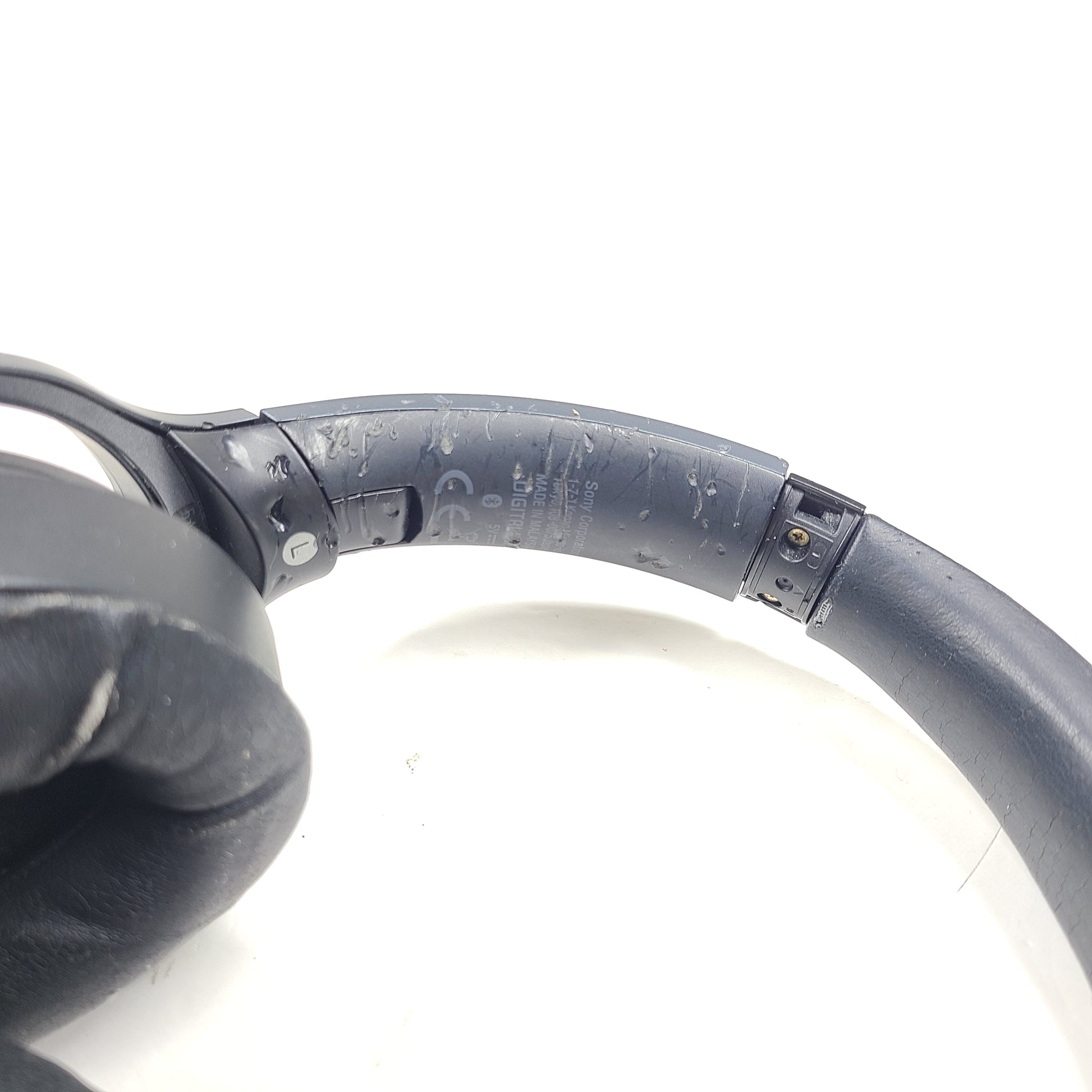 Black Sony WH-H900N wireless noise-cancelling headphones with cushioned ear pads and headband design.