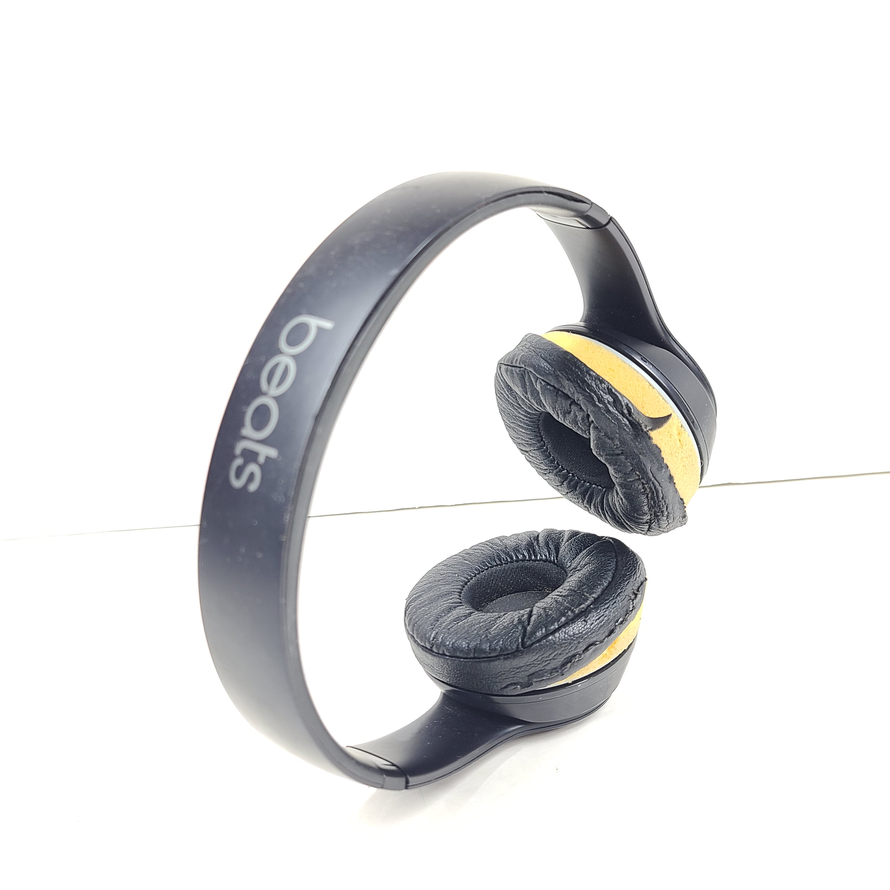 Black Beats Solo3 Wireless on-ear headphones with cushioned ear cups and adjustable headband.