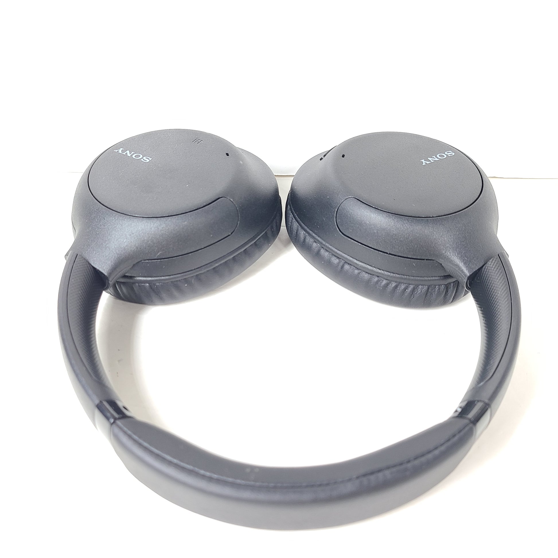 Black Sony WH-CH710N wireless over-ear headphones with active noise cancellation and cushioned earcups for extended comfort.