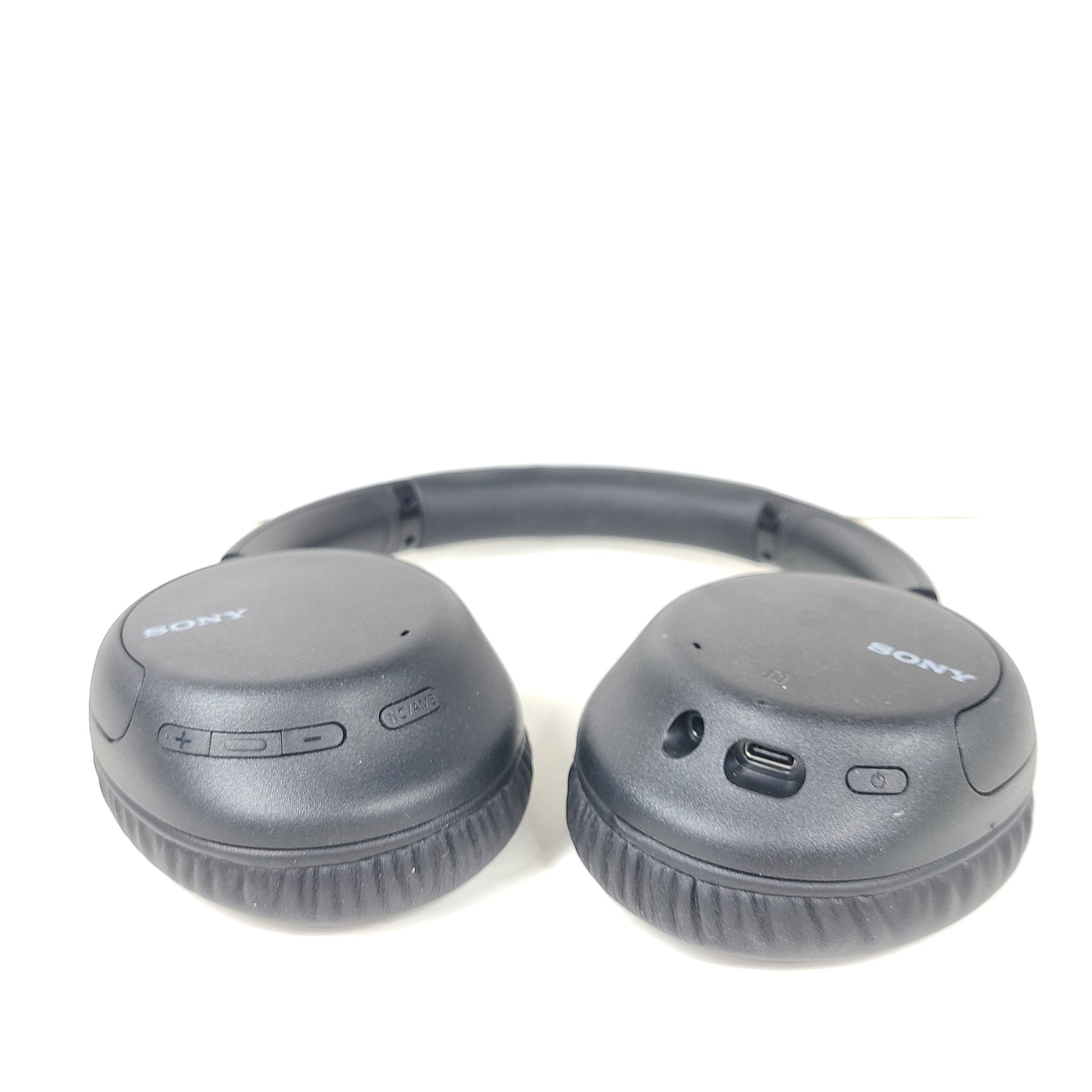 Black Sony WH-CH710N wireless over-ear headphones with active noise cancellation and cushioned earcups for extended comfort.