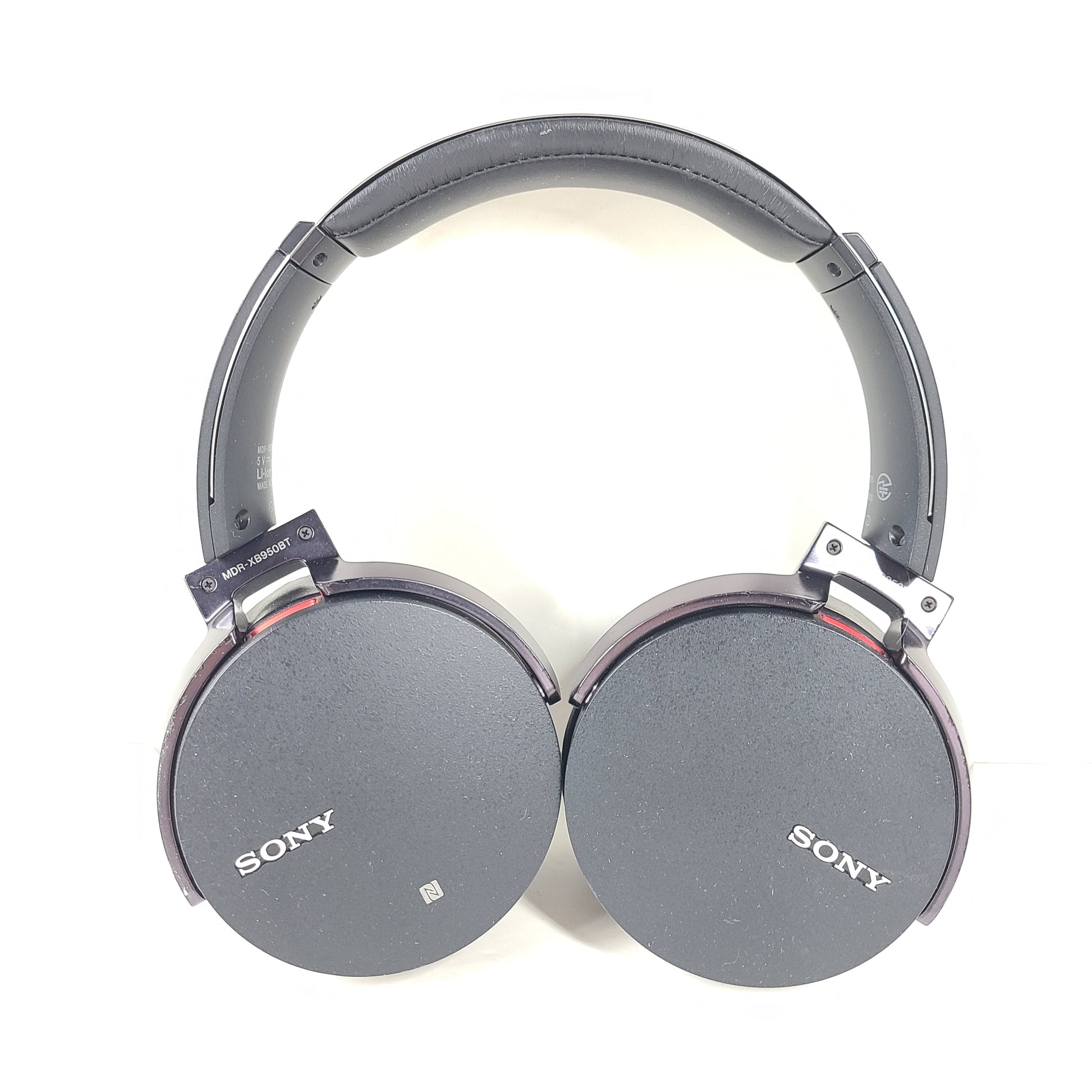 Black Sony MDR-XB950BT over-ear wireless headphones with padded headband and ear cushions.