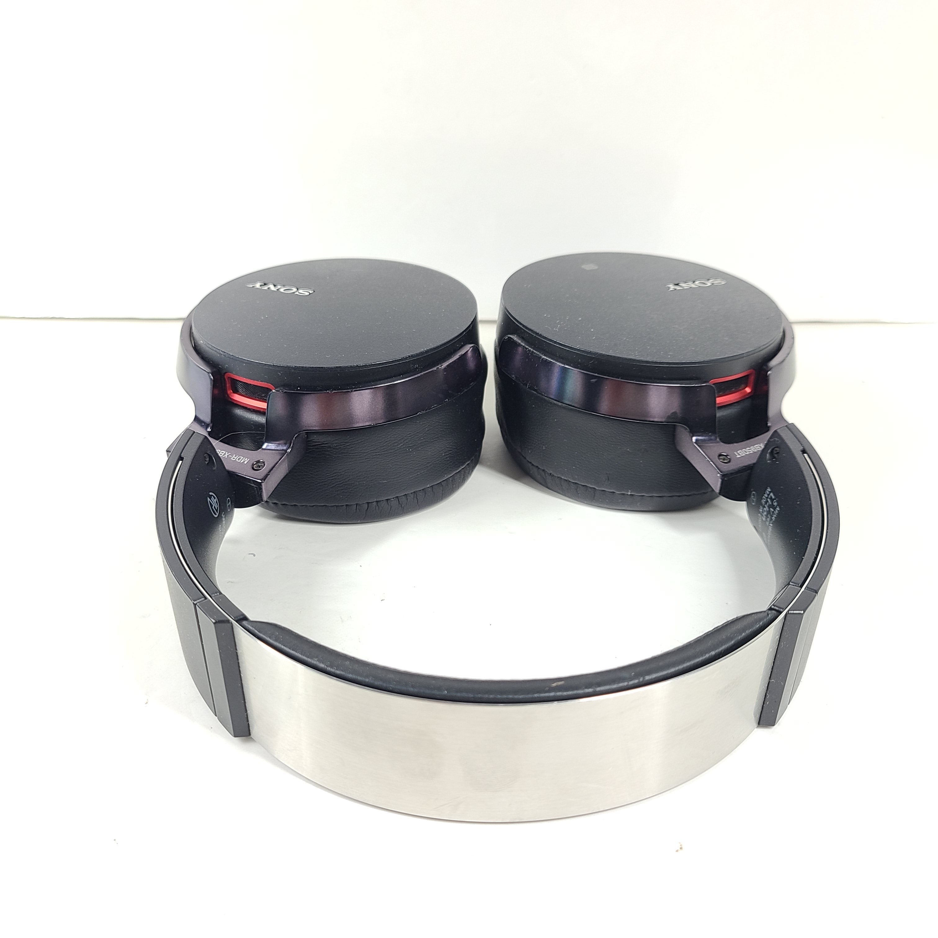 Black Sony MDR-XB950BT over-ear wireless headphones with padded headband and ear cushions.