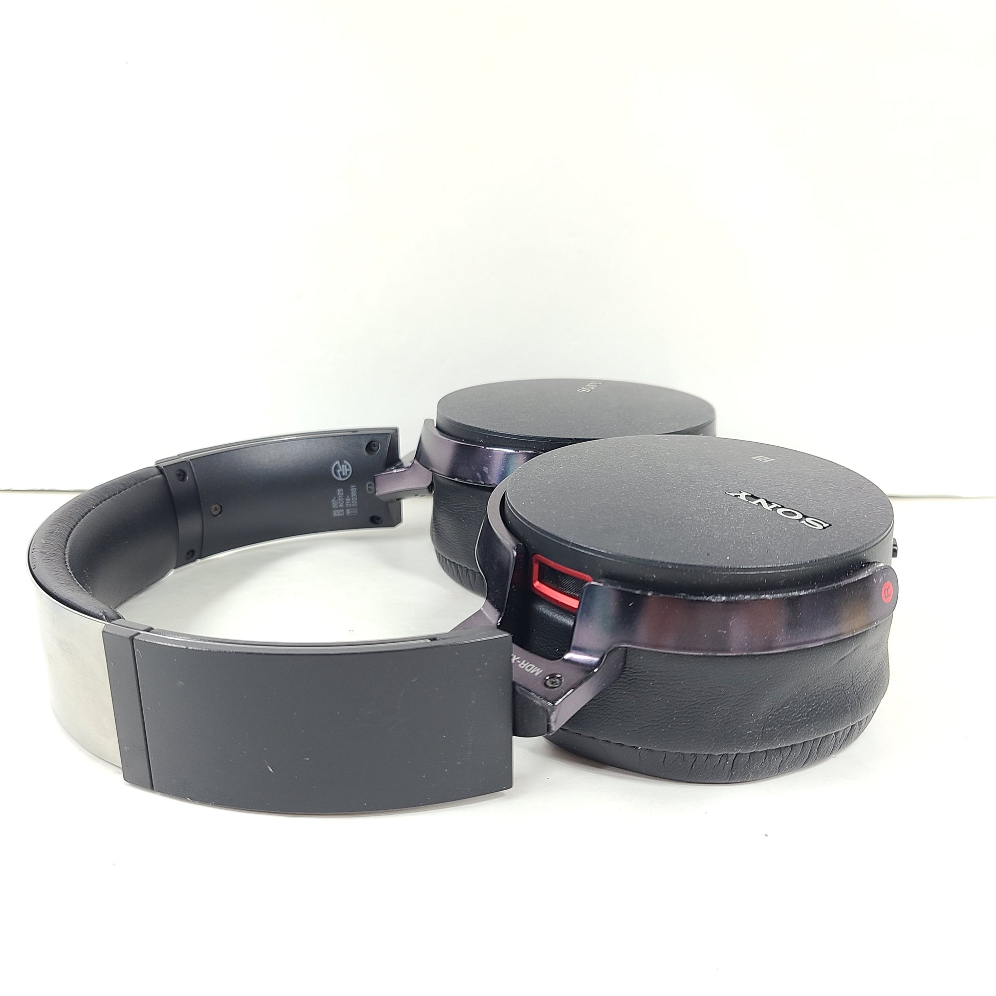Black Sony MDR-XB950BT over-ear wireless headphones with padded headband and ear cushions.