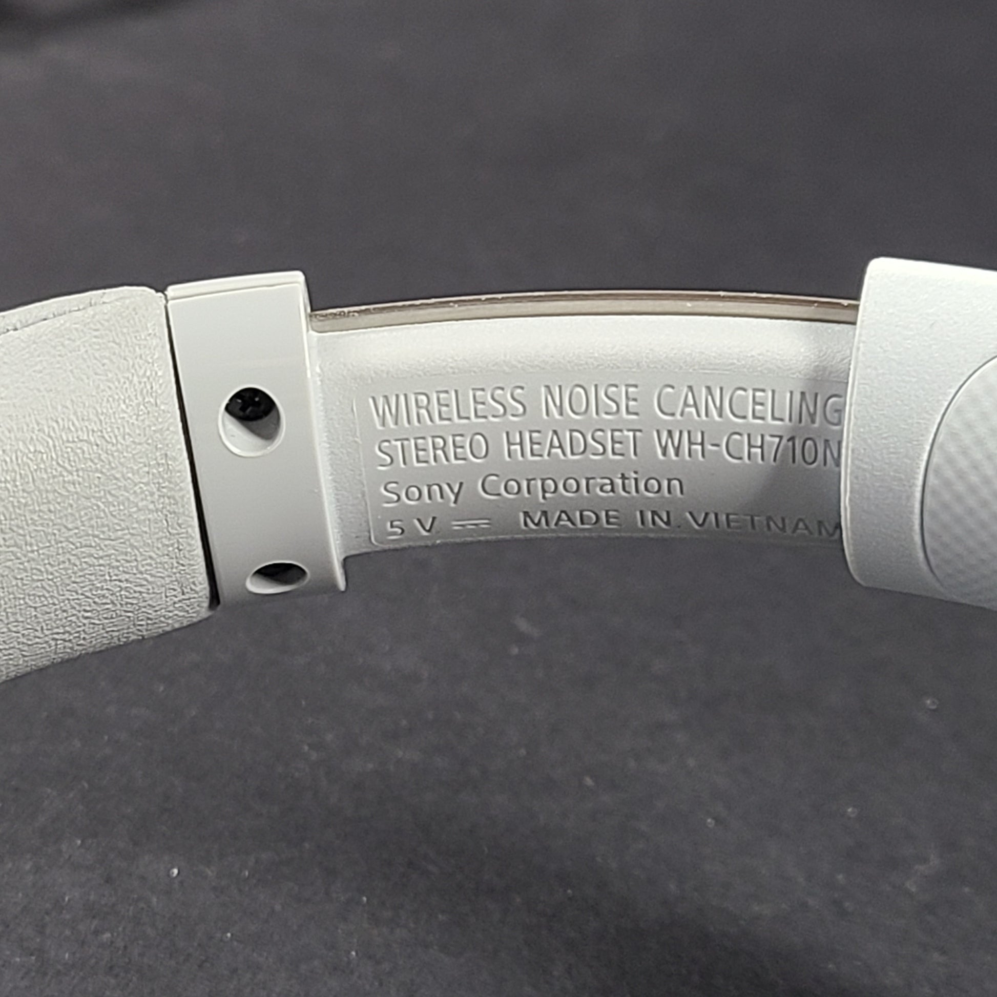 Sony WH-CH710N wireless over-ear headphones in gray with active noise cancellation and cushioned earcups.