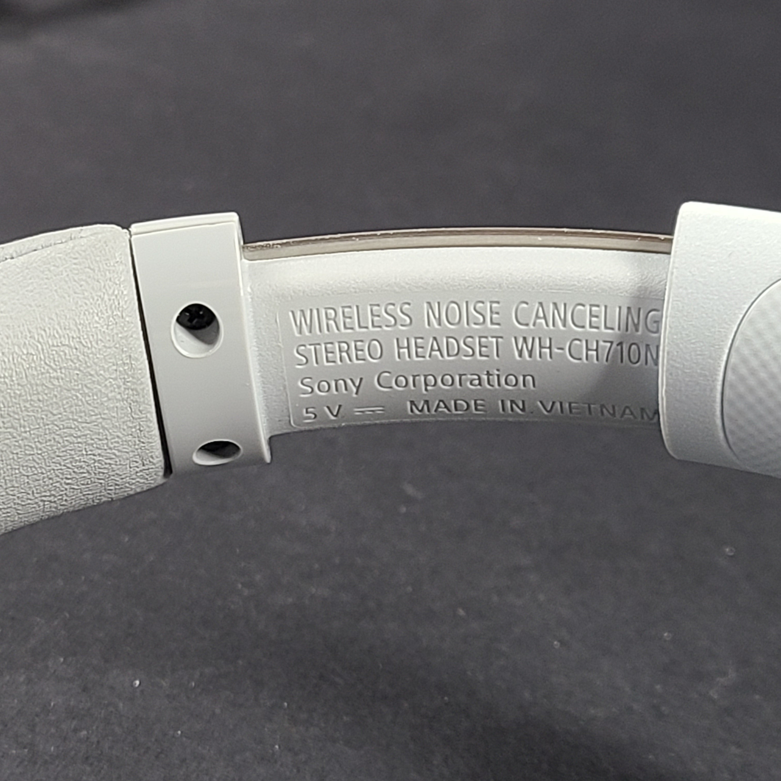 Sony WH-CH710N wireless over-ear headphones in gray with active noise cancellation and cushioned earcups.