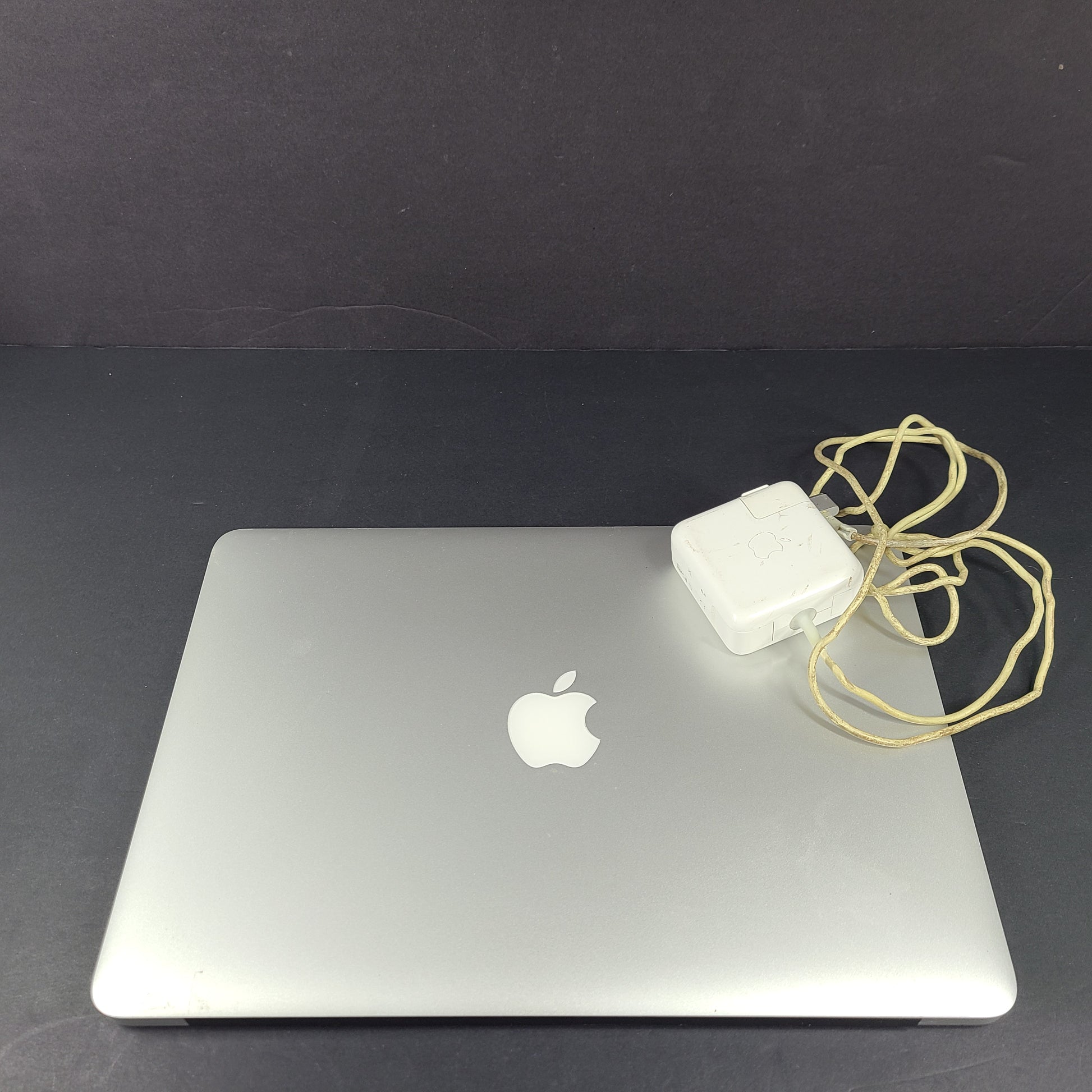 Sleek silver MacBook Air with 2.2GHz Intel Core i7 and 8GB RAM for on-the-go productivity.