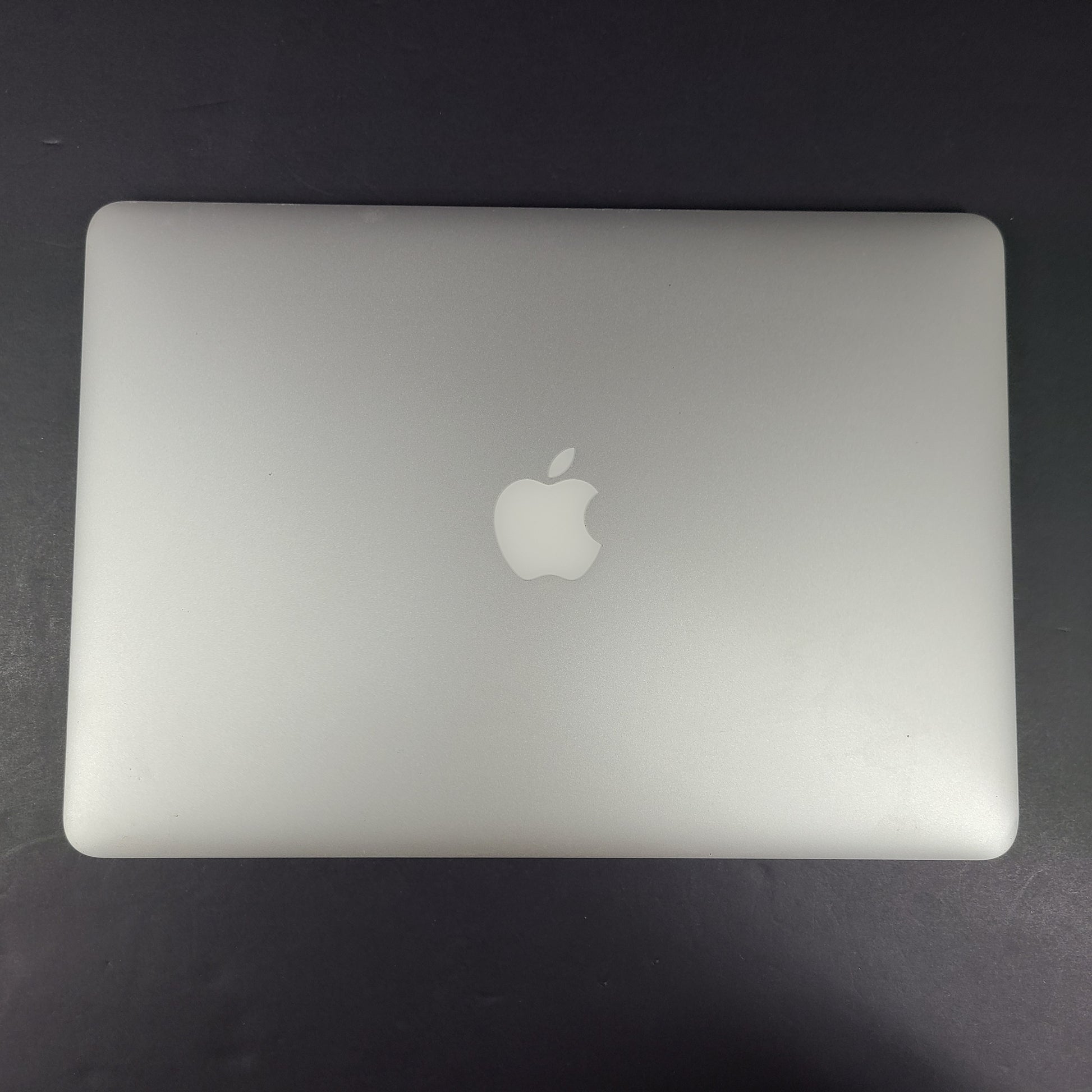 Sleek silver MacBook Air with 2.2GHz Intel Core i7 and 8GB RAM for on-the-go productivity.
