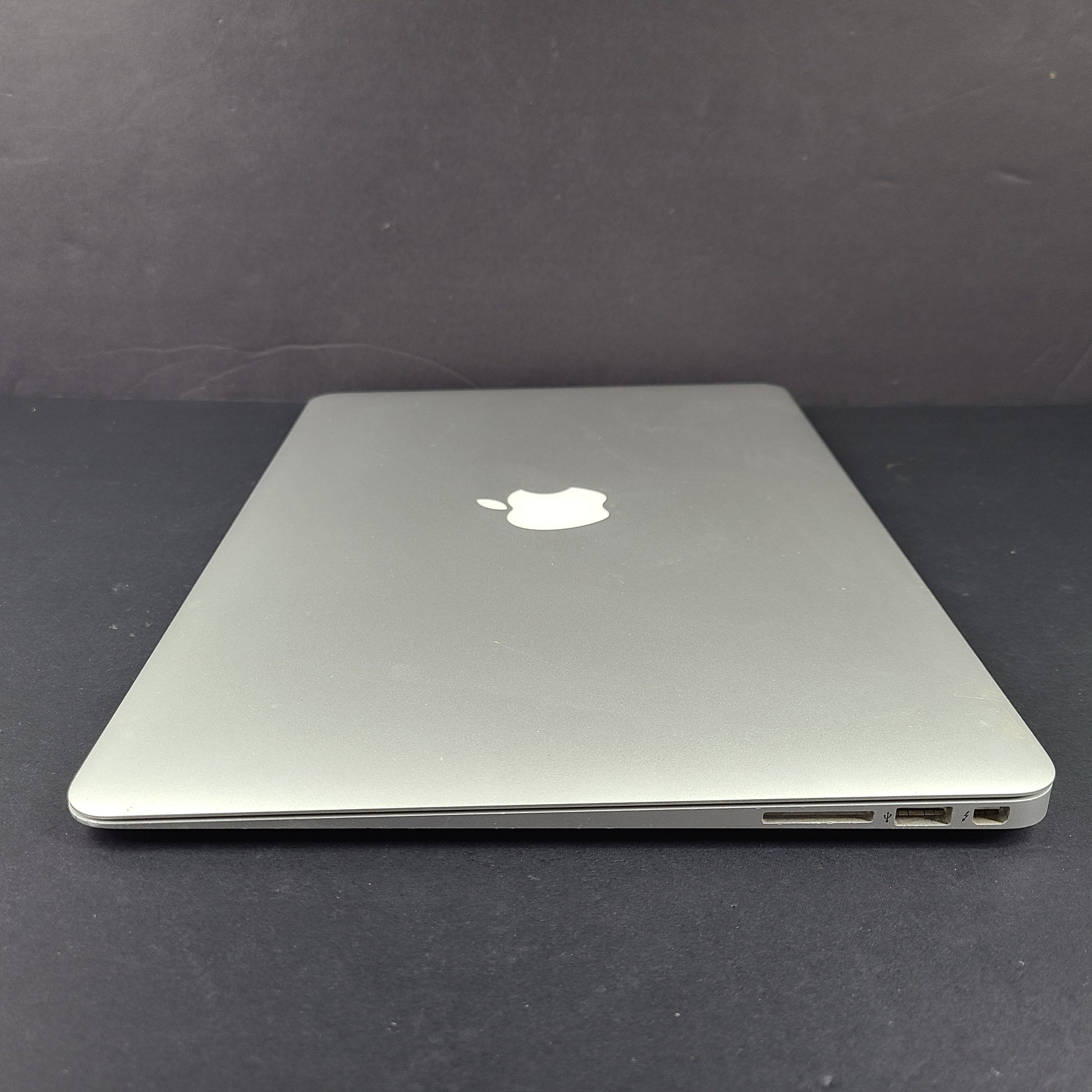 Sleek silver MacBook Air with 2.2GHz Intel Core i7 and 8GB RAM for on-the-go productivity.