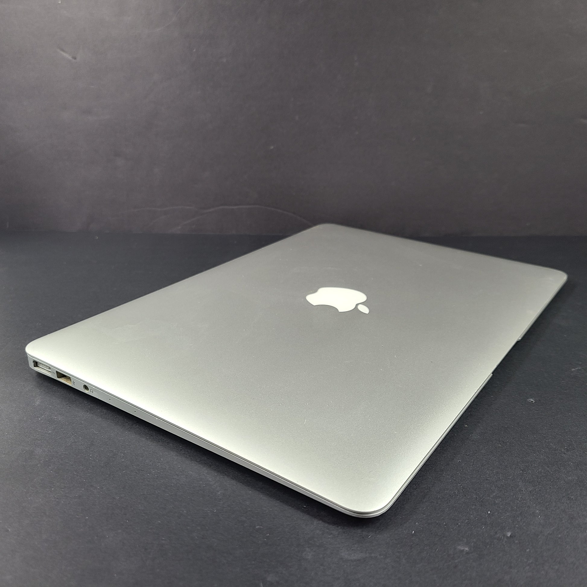 Sleek silver MacBook Air with 2.2GHz Intel Core i7 and 8GB RAM for on-the-go productivity.