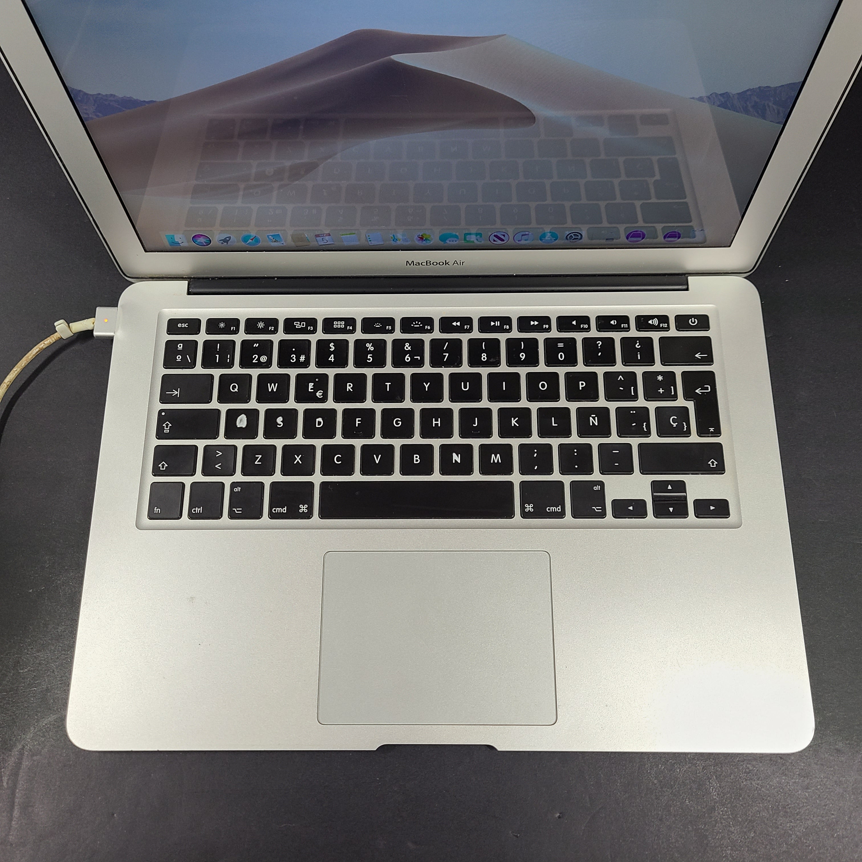 Sleek silver MacBook Air with 2.2GHz Intel Core i7 and 8GB RAM for on-the-go productivity.