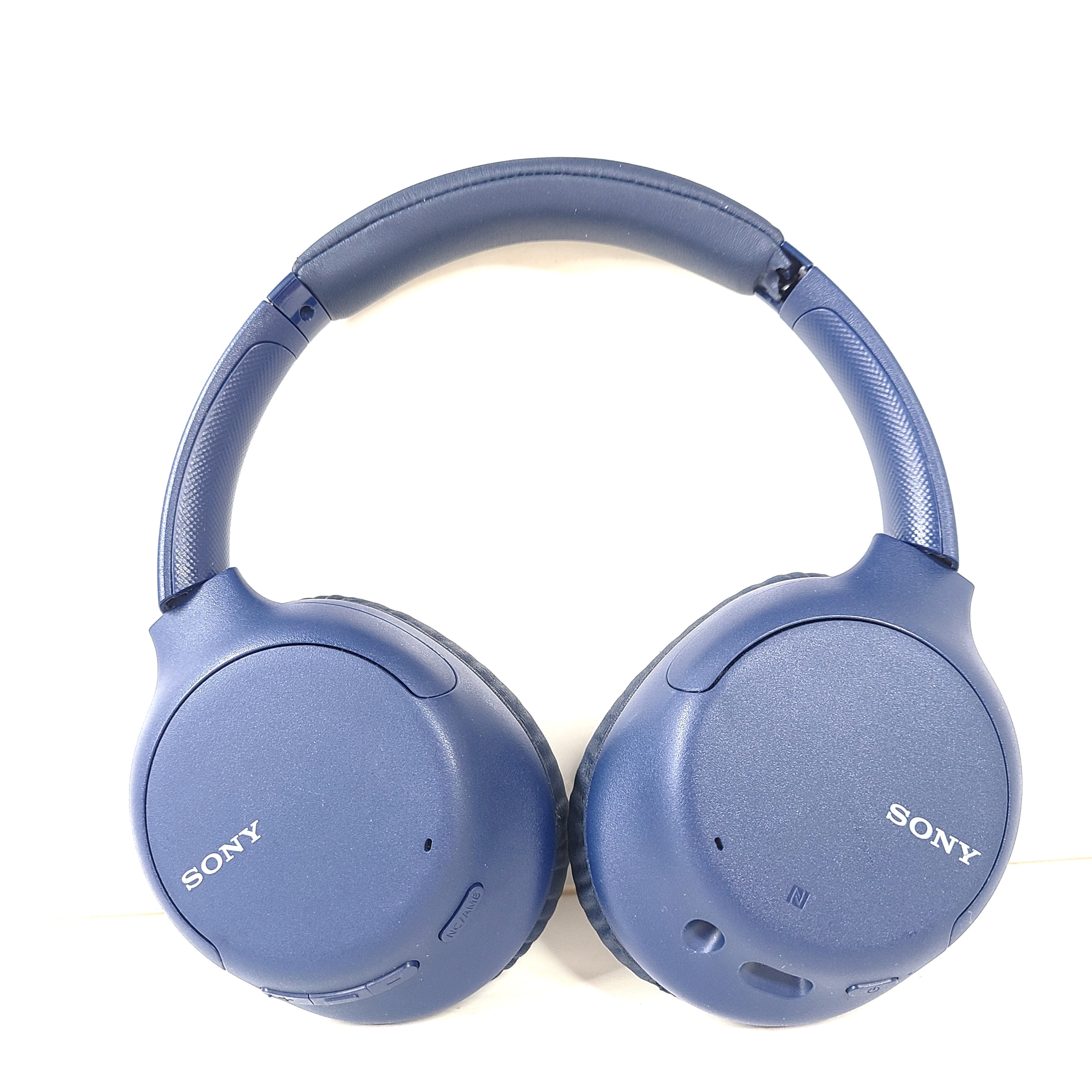 Over-ear Sony WH-CH710N wireless noise-cancelling headphones in blue with cushioned ear cups.