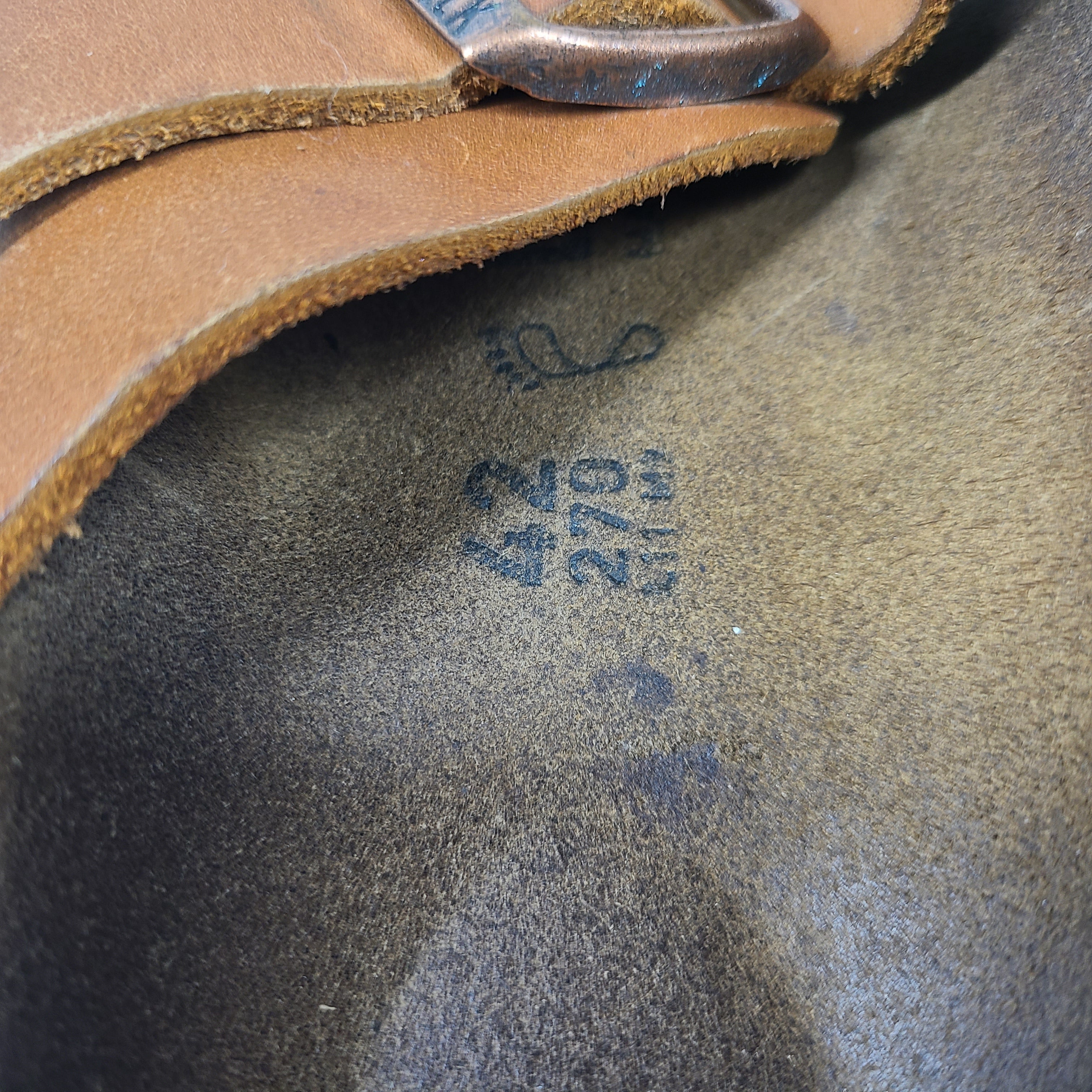 Brown Birkenstock sandals in EU size 42, model 278 with an imprint on the footbed and mild wear on straps and footbeds.