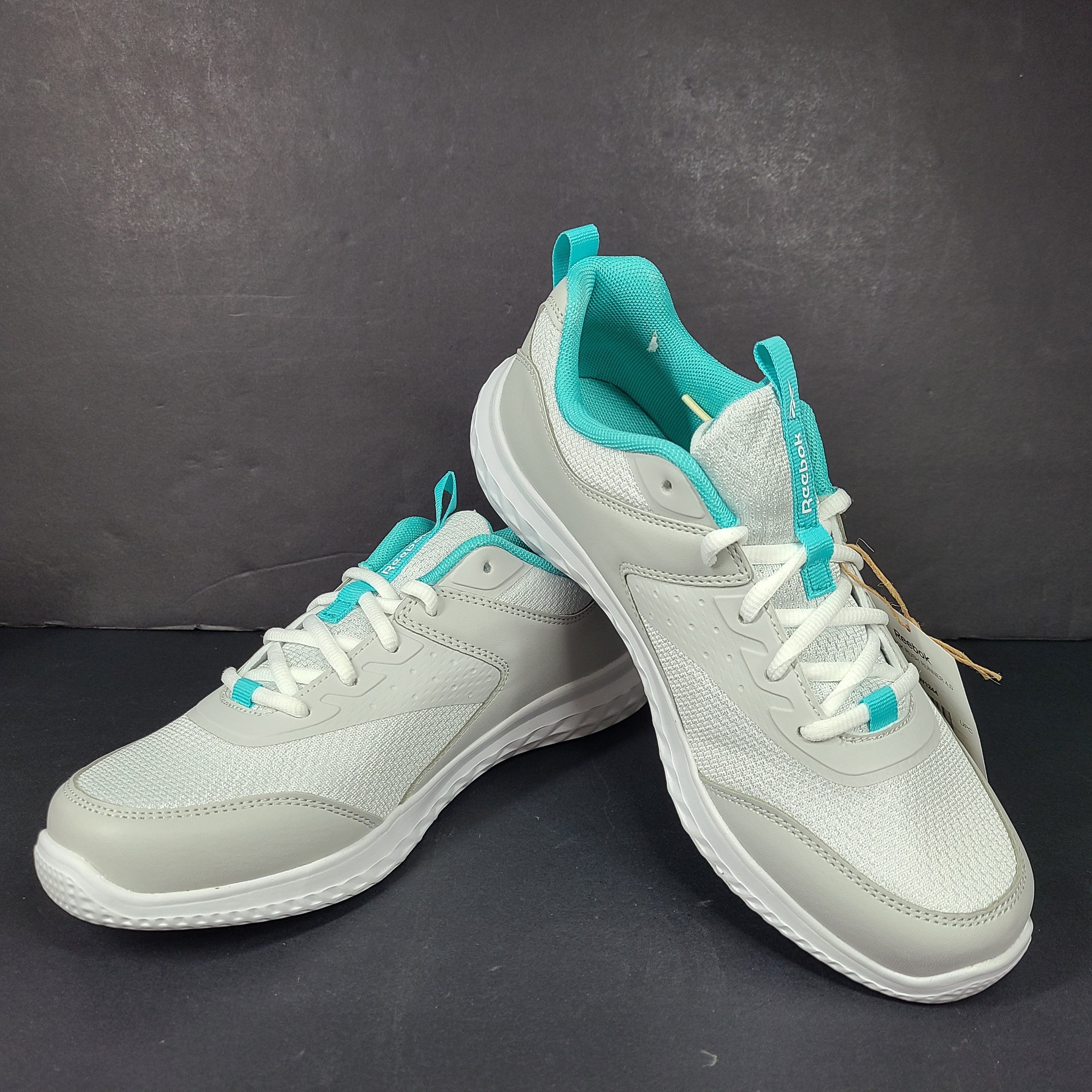 New Reebok Rush Runner 4.0 in white and teal, two pairs in US sizes 5.5 and 7.