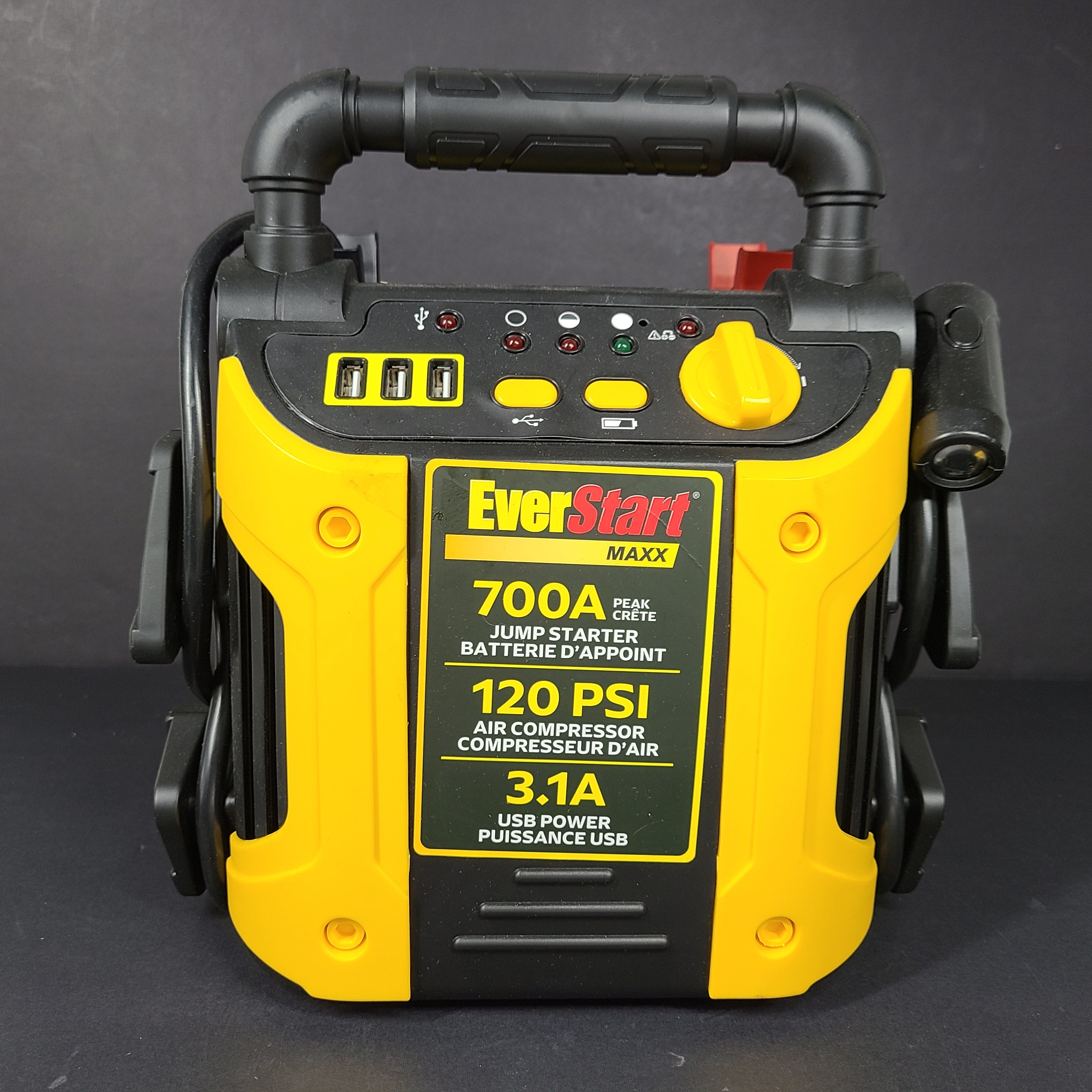 Yellow and black EverStart Maxx jump starter with built-in jumper cables and an integrated air compressor for portable vehicle power and inflation.