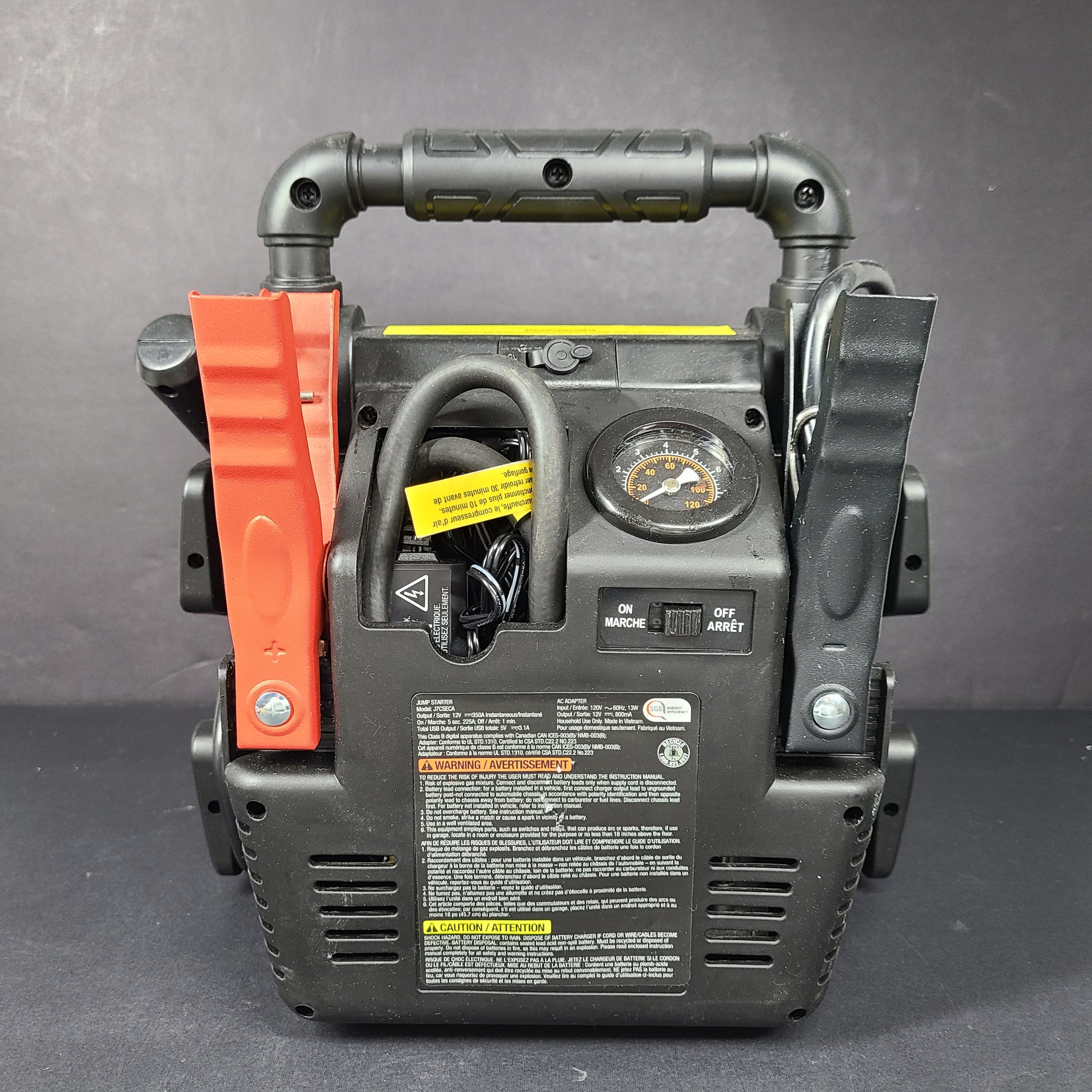 Yellow and black EverStart Maxx jump starter with built-in jumper cables and an integrated air compressor for portable vehicle power and inflation.