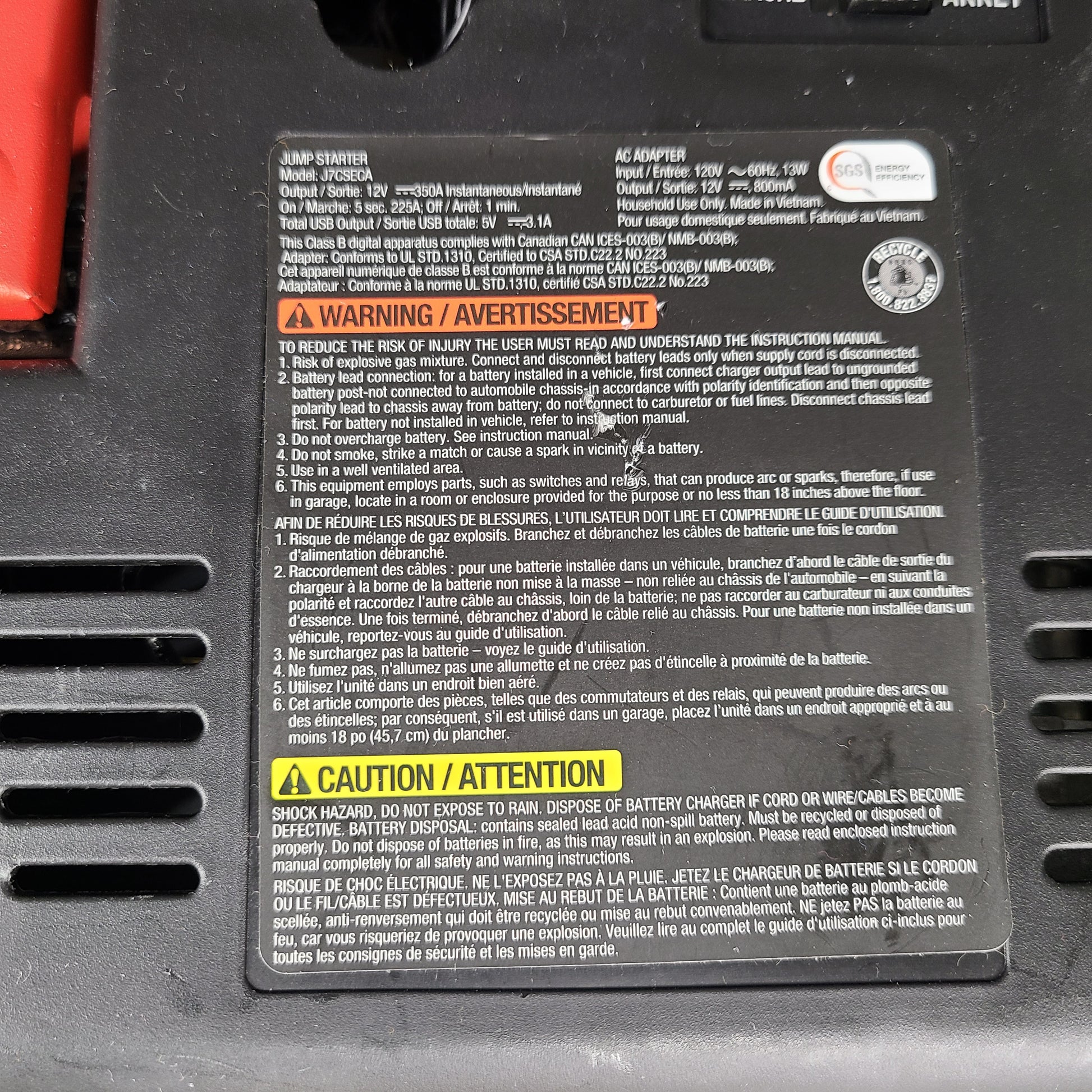 Yellow and black EverStart Maxx jump starter with built-in jumper cables and an integrated air compressor for portable vehicle power and inflation.