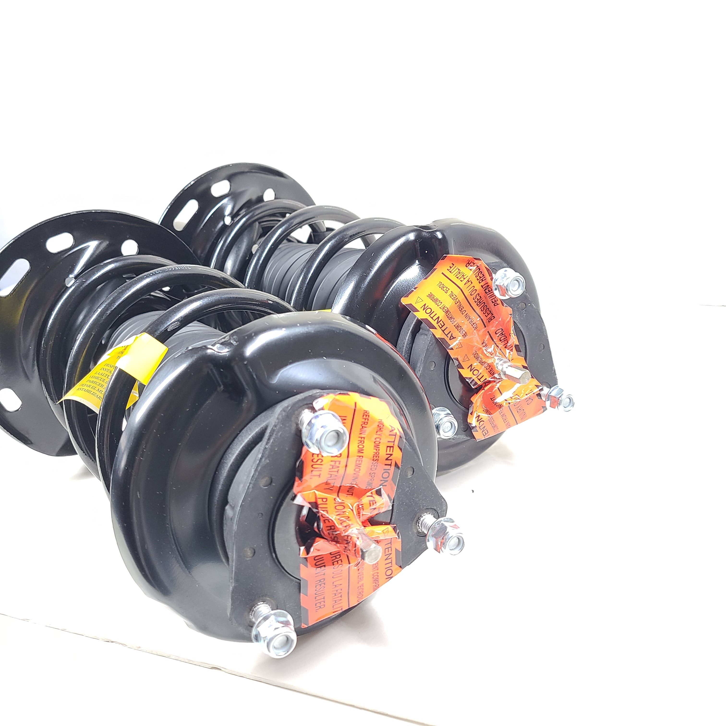 Two Shoxtec Complete Struts in black with mounting accessories for vehicle suspension replacement.