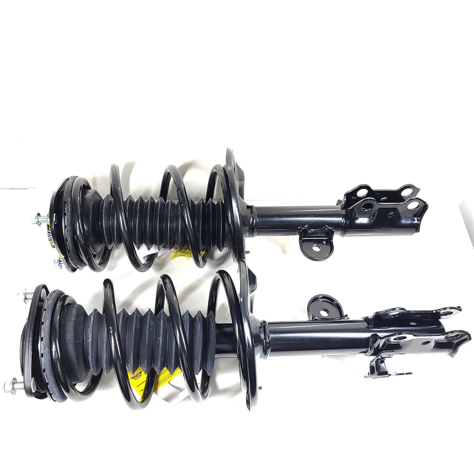 Unity black suspension strut assembly for models 123LL246 and 124CL245, intended for vehicle suspension replacement.