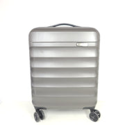 Gray ESPACE carry-on luggage constructed from polyethylene vinyl acetate with scuffs and an intact interior.