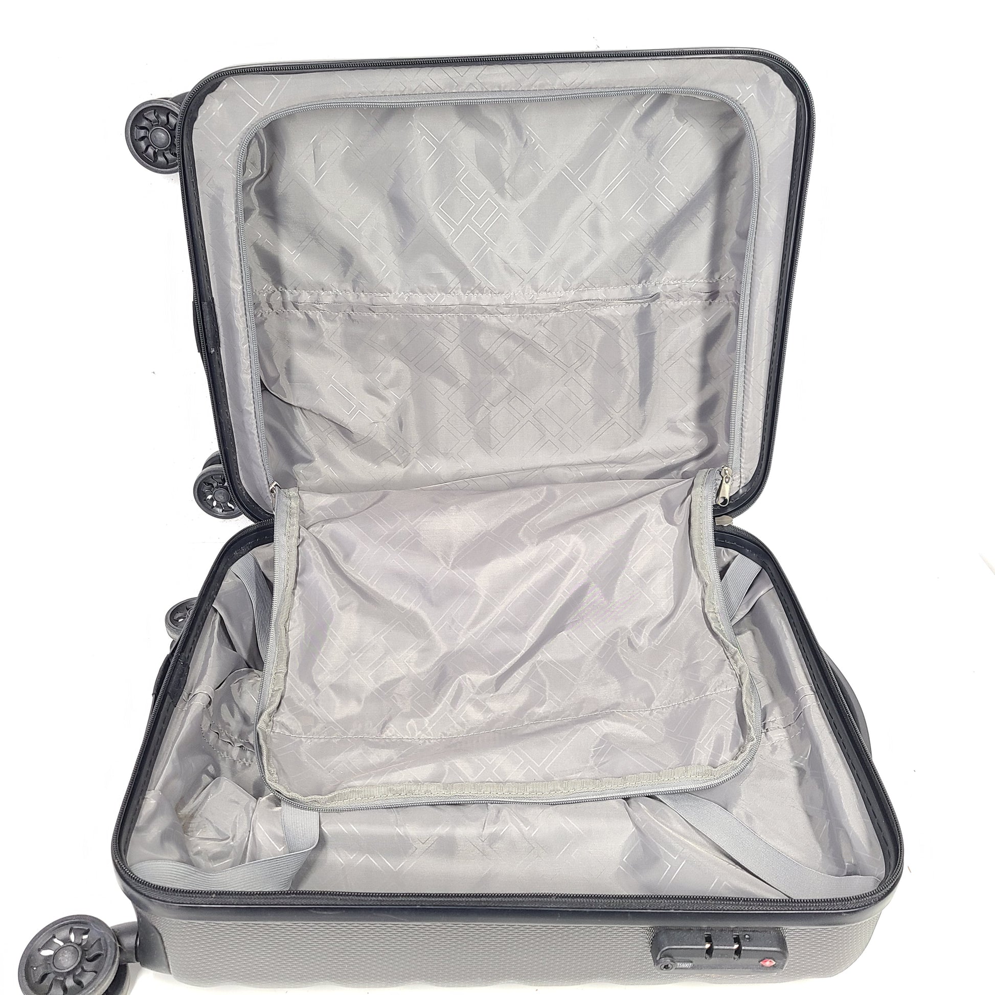 Gray ESPACE carry-on luggage constructed from polyethylene vinyl acetate with scuffs and an intact interior.