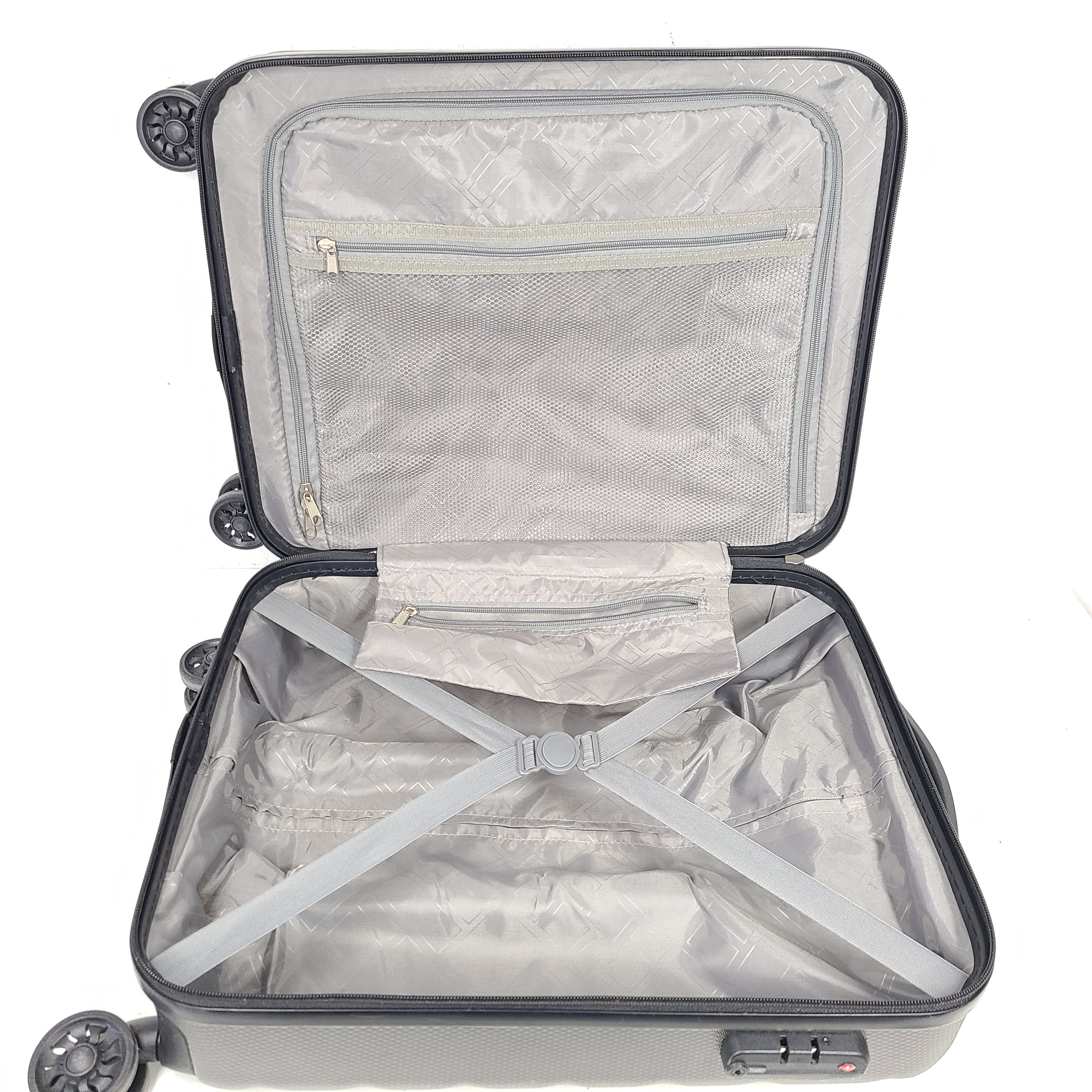 Gray ESPACE carry-on luggage constructed from polyethylene vinyl acetate with scuffs and an intact interior.