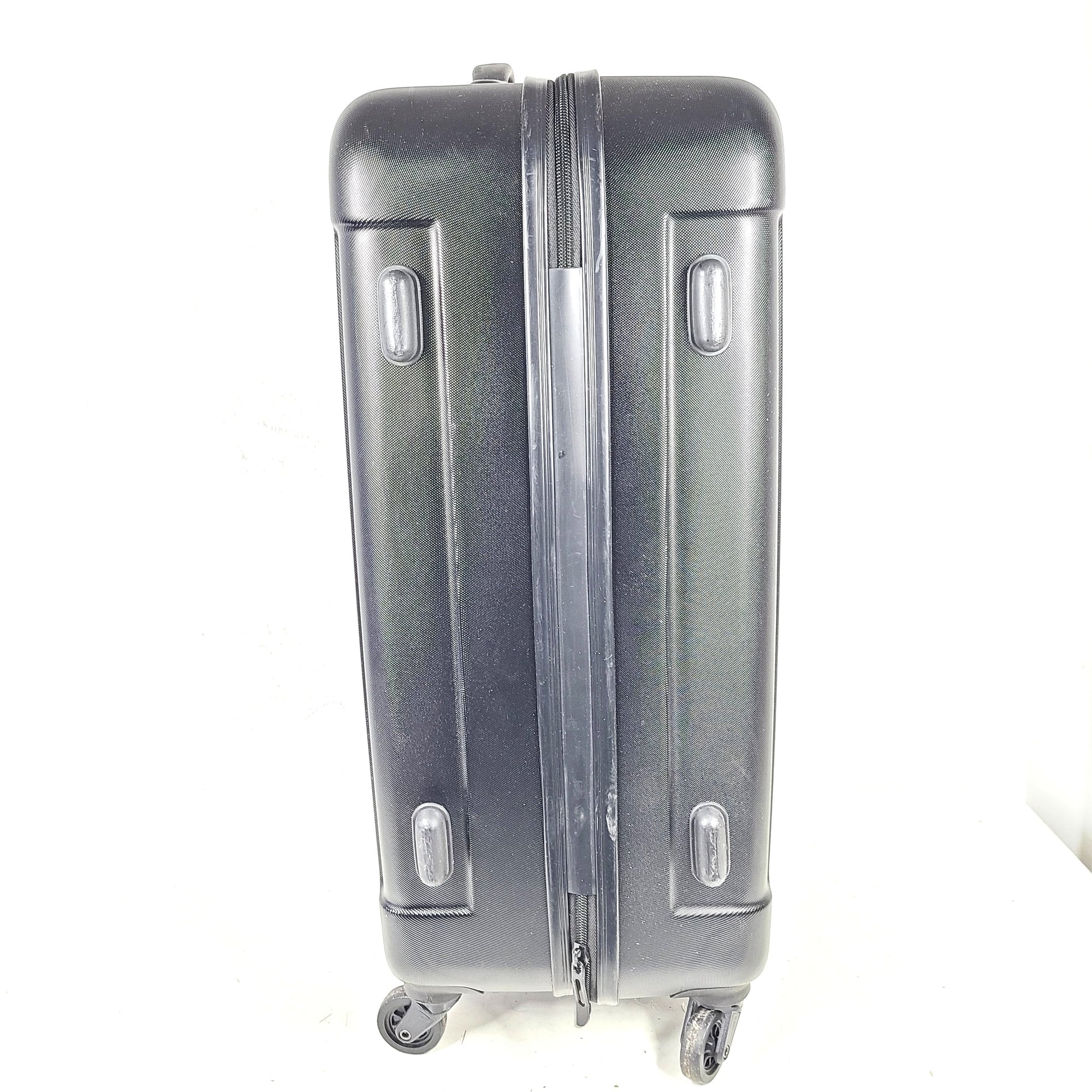 Black ABS/PC hardshell luggage HLG1602 by InUSA with minor surface wear and light scratches.