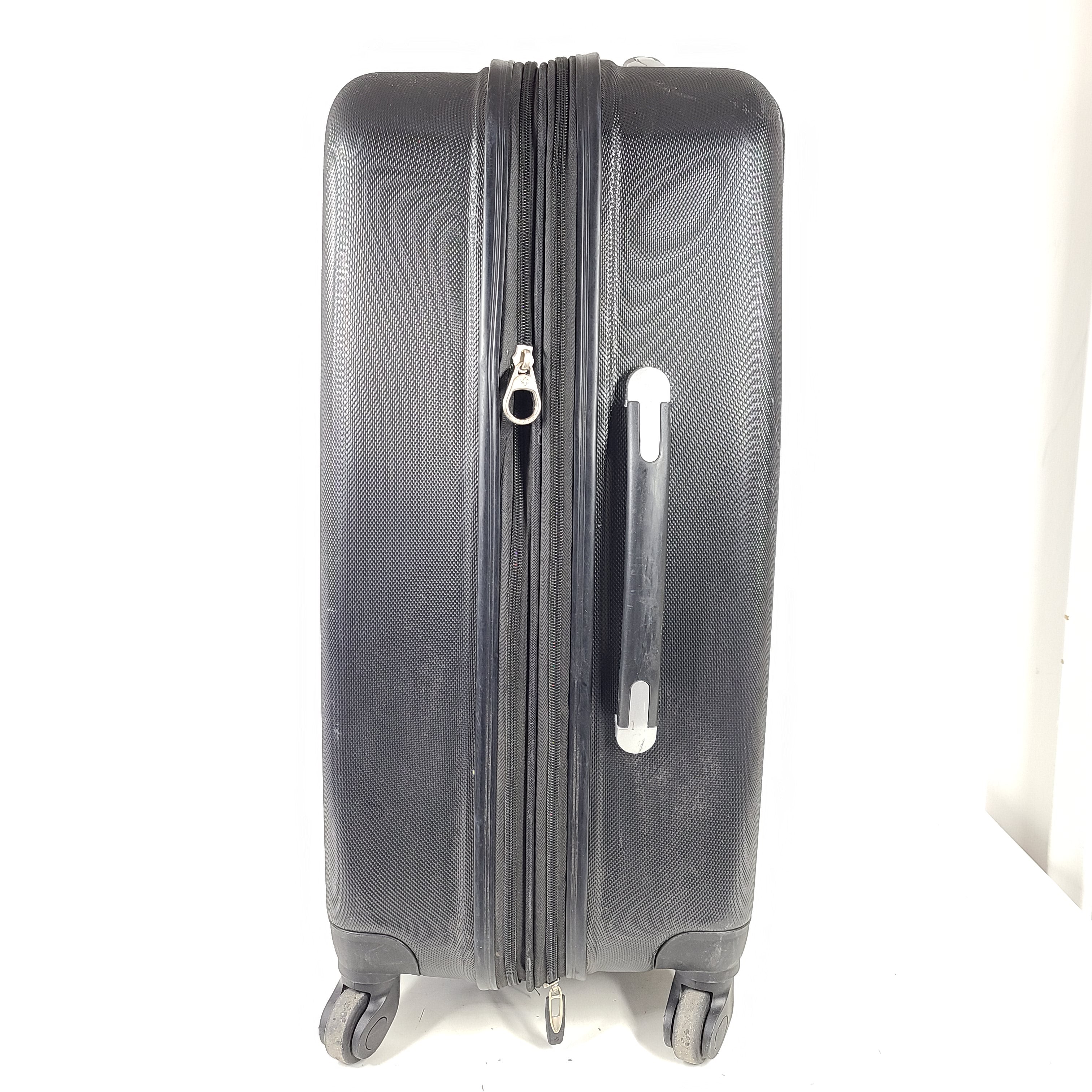 Black Samsonite suitcase model 5000230 with light scuff marks and a clean interior.