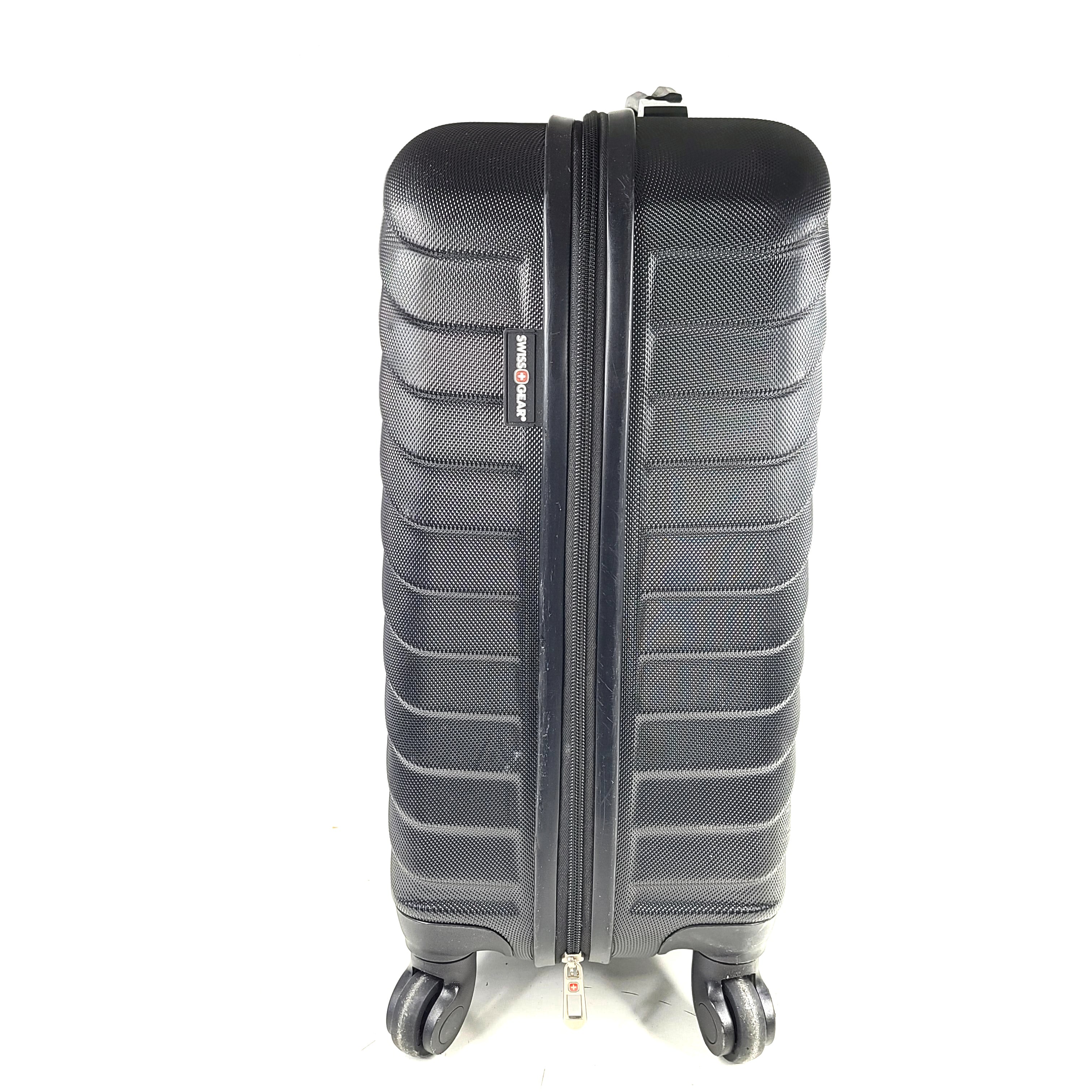 Black SwissGear suitcase with interior logo lining and scuff marks on the exterior.