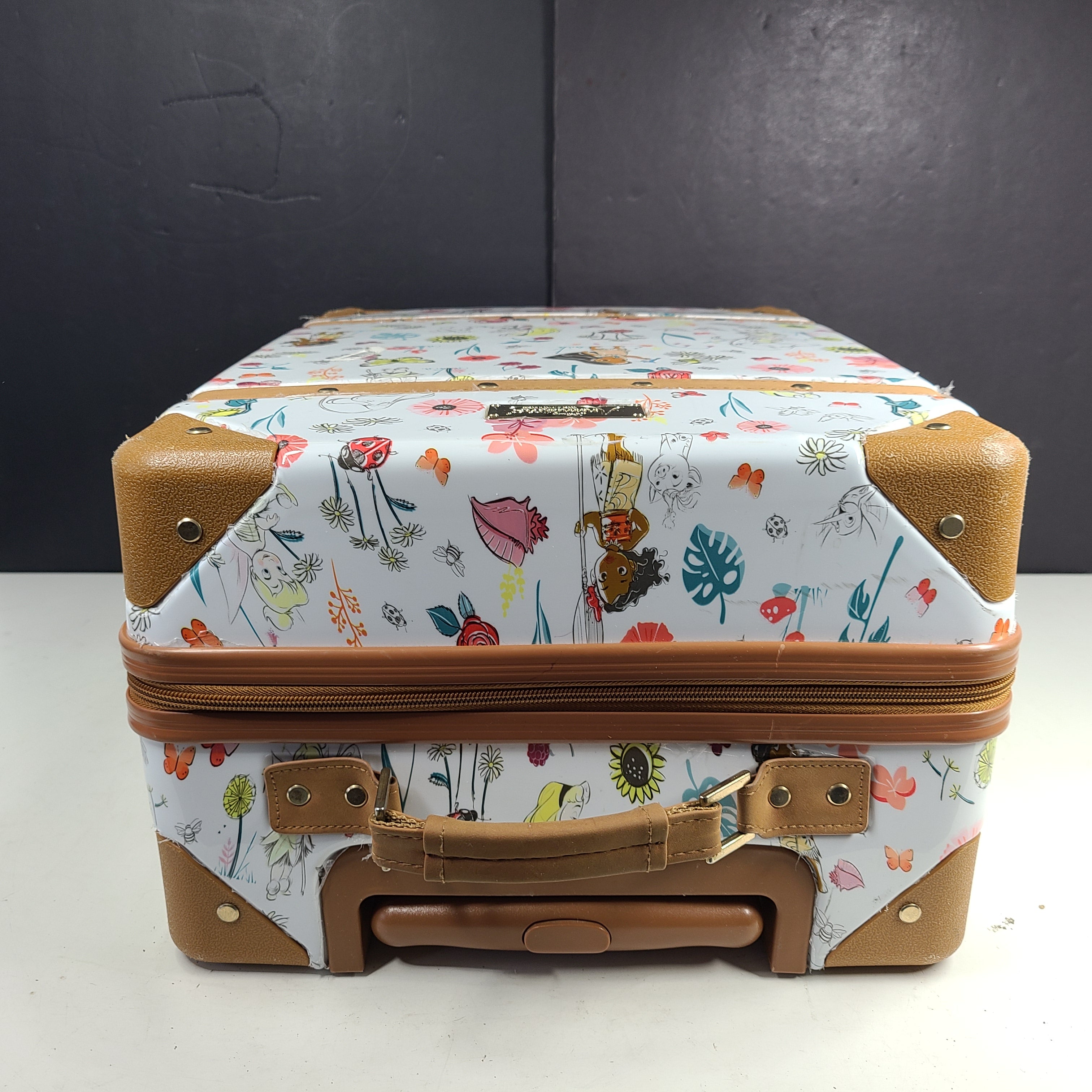 Multicolor faux-leather Disney Animators luggage in one size for stylish travel.