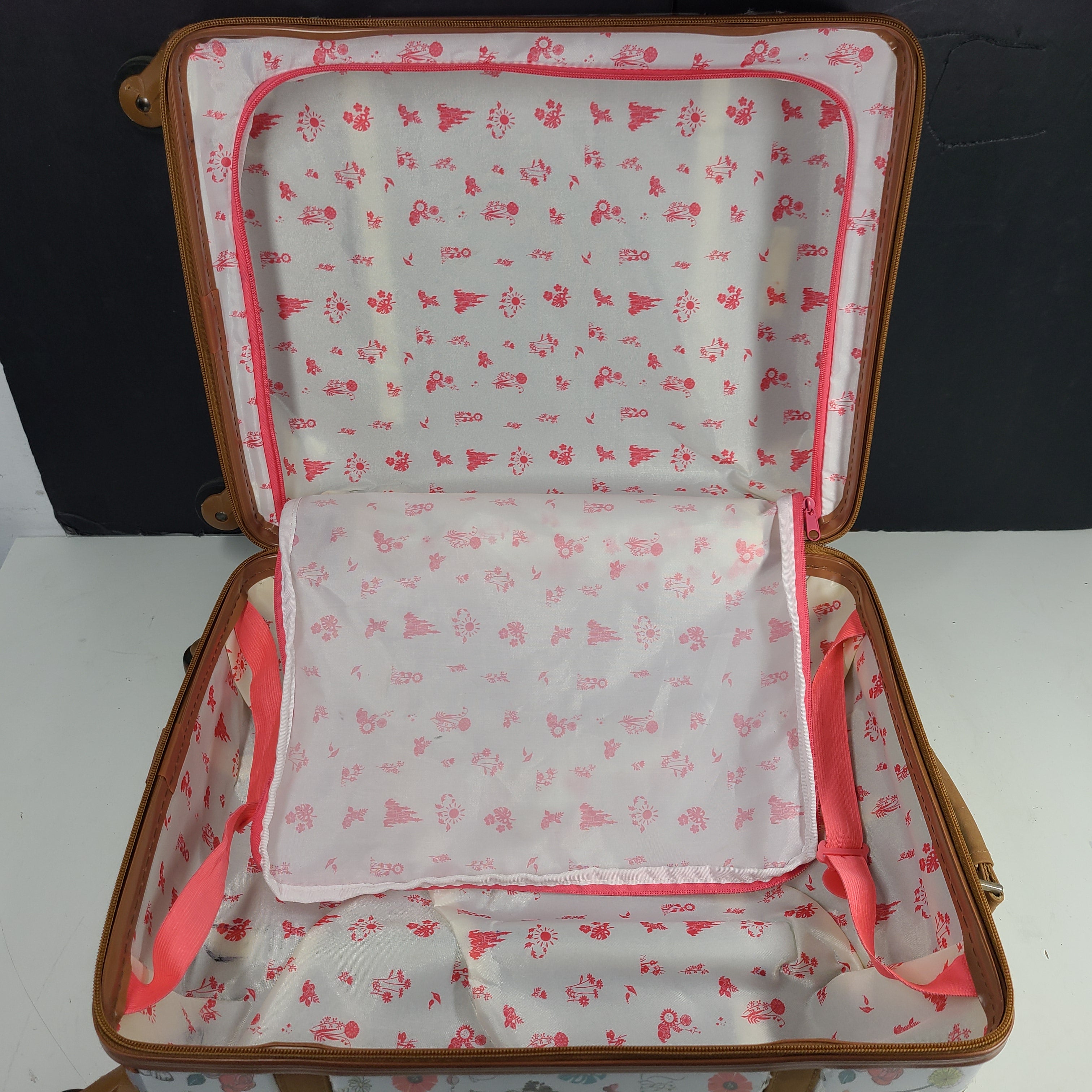 Multicolor faux-leather Disney Animators luggage in one size for stylish travel.