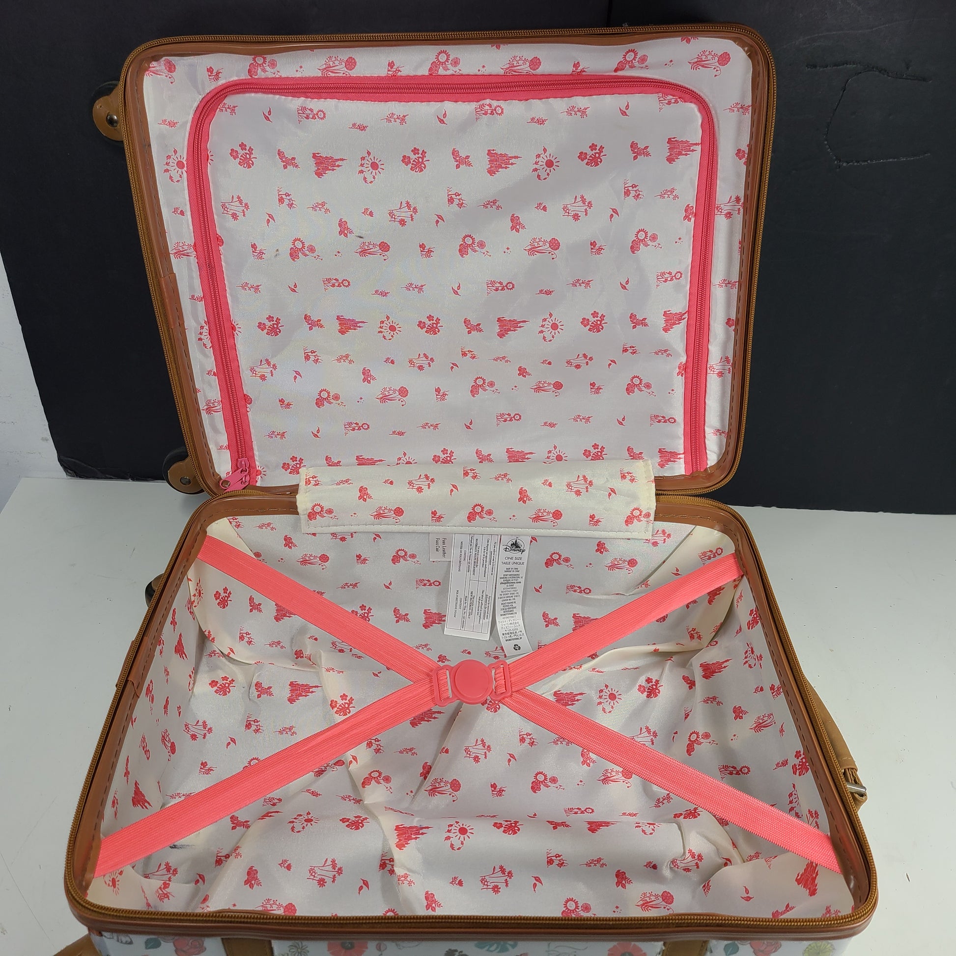 Multicolor faux-leather Disney Animators luggage in one size for stylish travel.