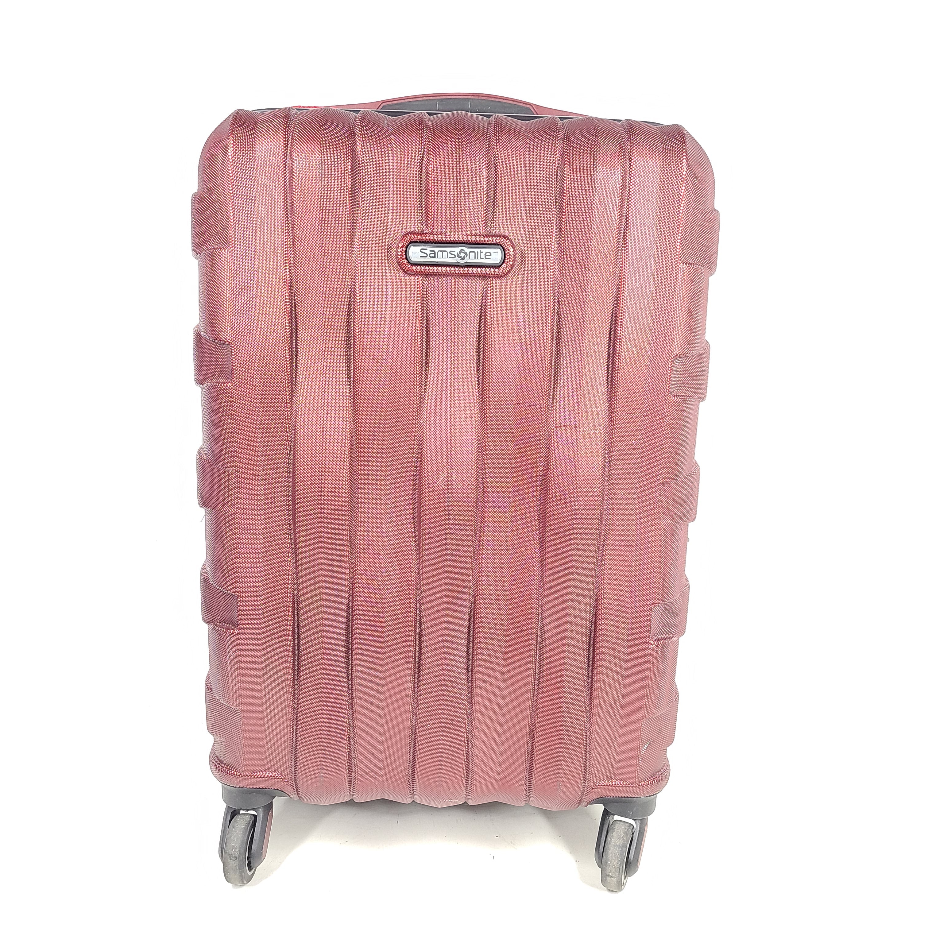 Red Samsonite spinner suitcase Model 7494 featuring a polyethylene vinyl acetate shell for travel durability.