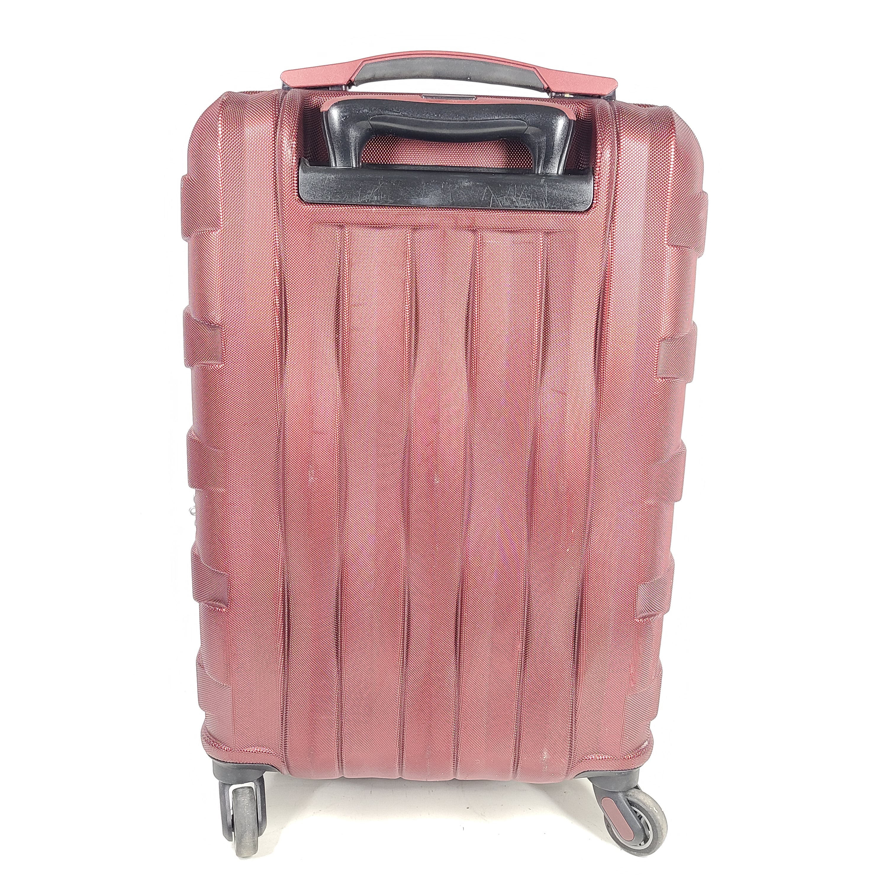 Red Samsonite spinner suitcase Model 7494 featuring a polyethylene vinyl acetate shell for travel durability.