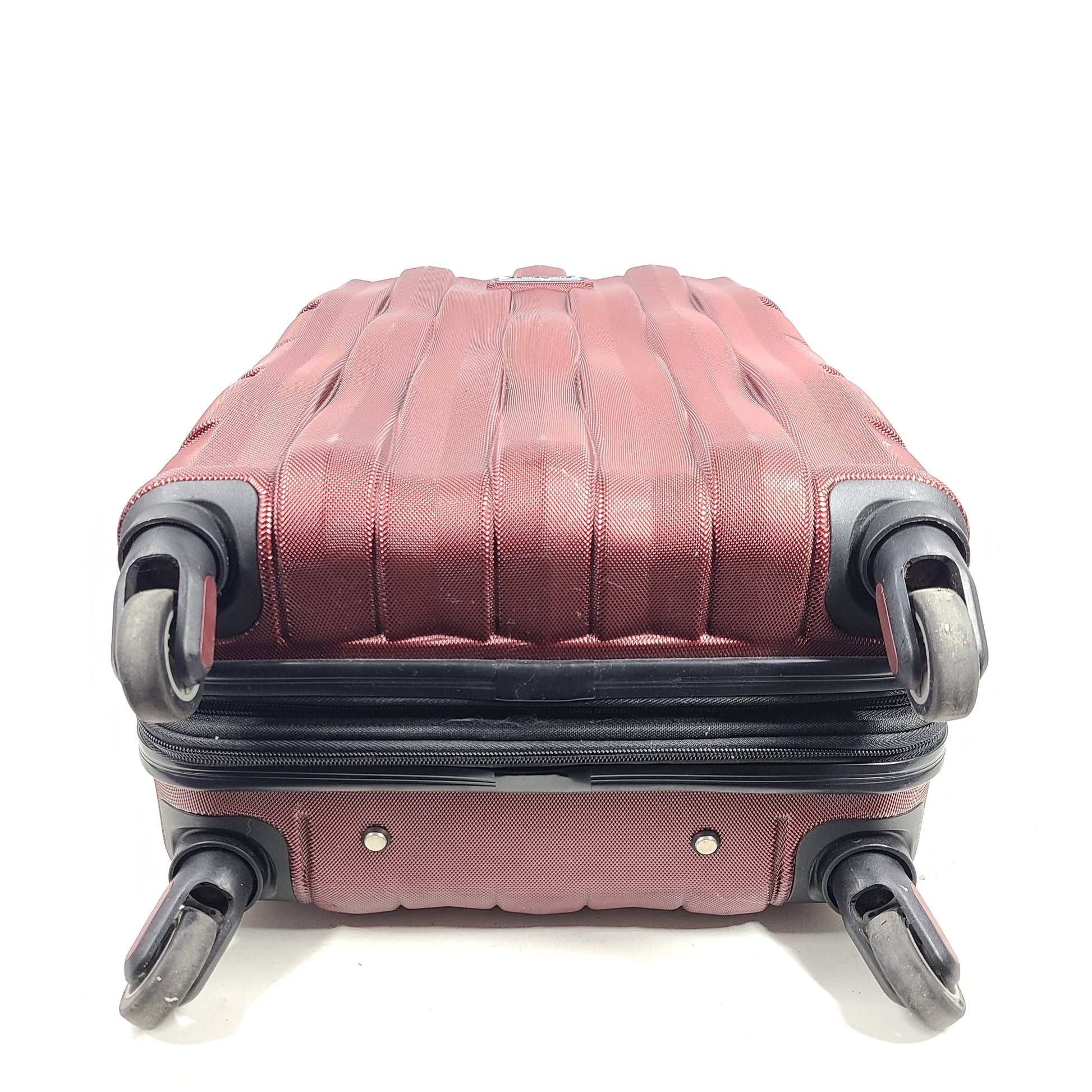Red Samsonite spinner suitcase Model 7494 featuring a polyethylene vinyl acetate shell for travel durability.