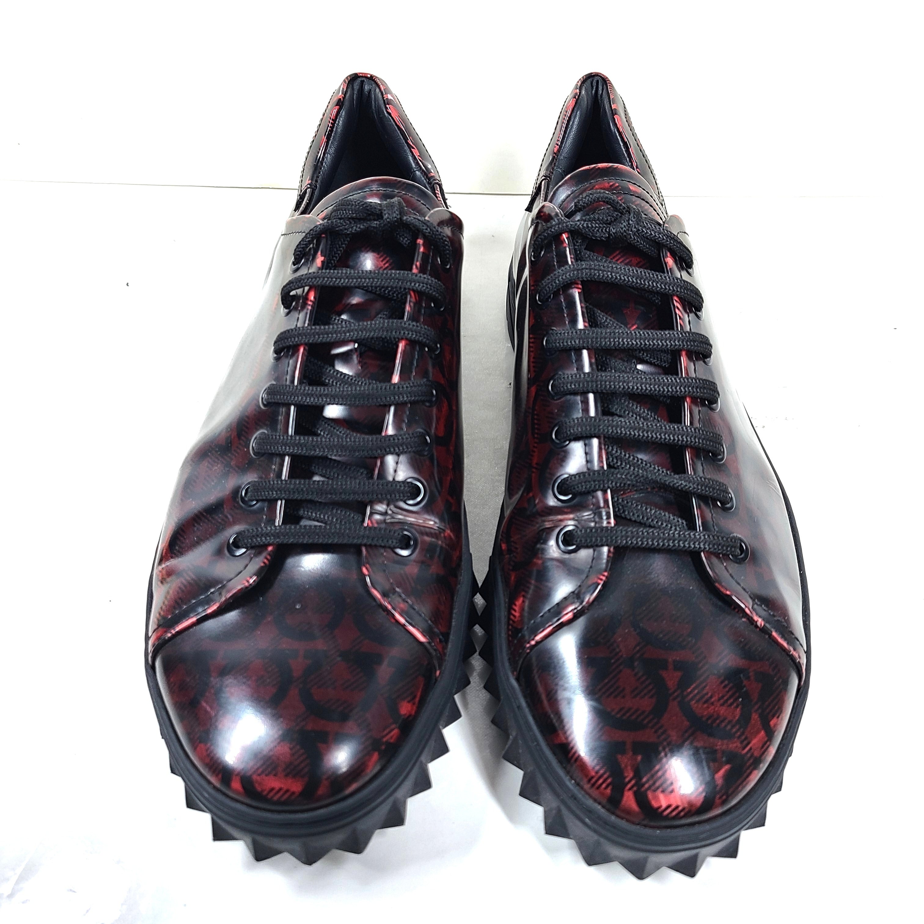 Red and black Salvatore Ferragamo TZ leather sneakers in size 11 1/2 M with Italian craftsmanship and contrast detailing.