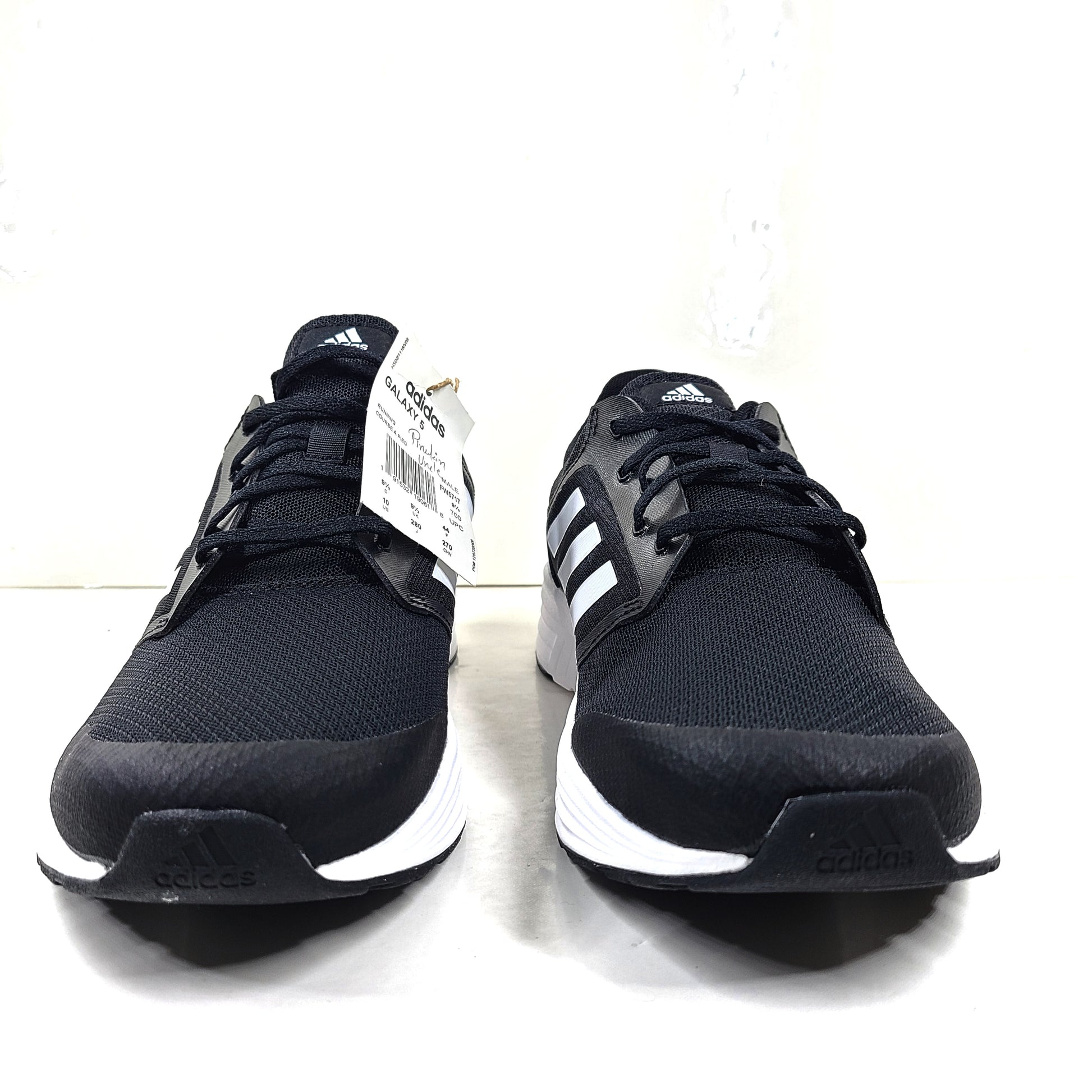 Adidas Galaxy 5 running shoe in black and white, US size 10, designed for everyday training and comfort.