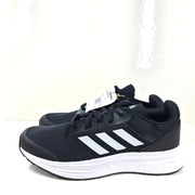 Adidas Galaxy 5 running shoe in black and white, US size 10, designed for everyday training and comfort.