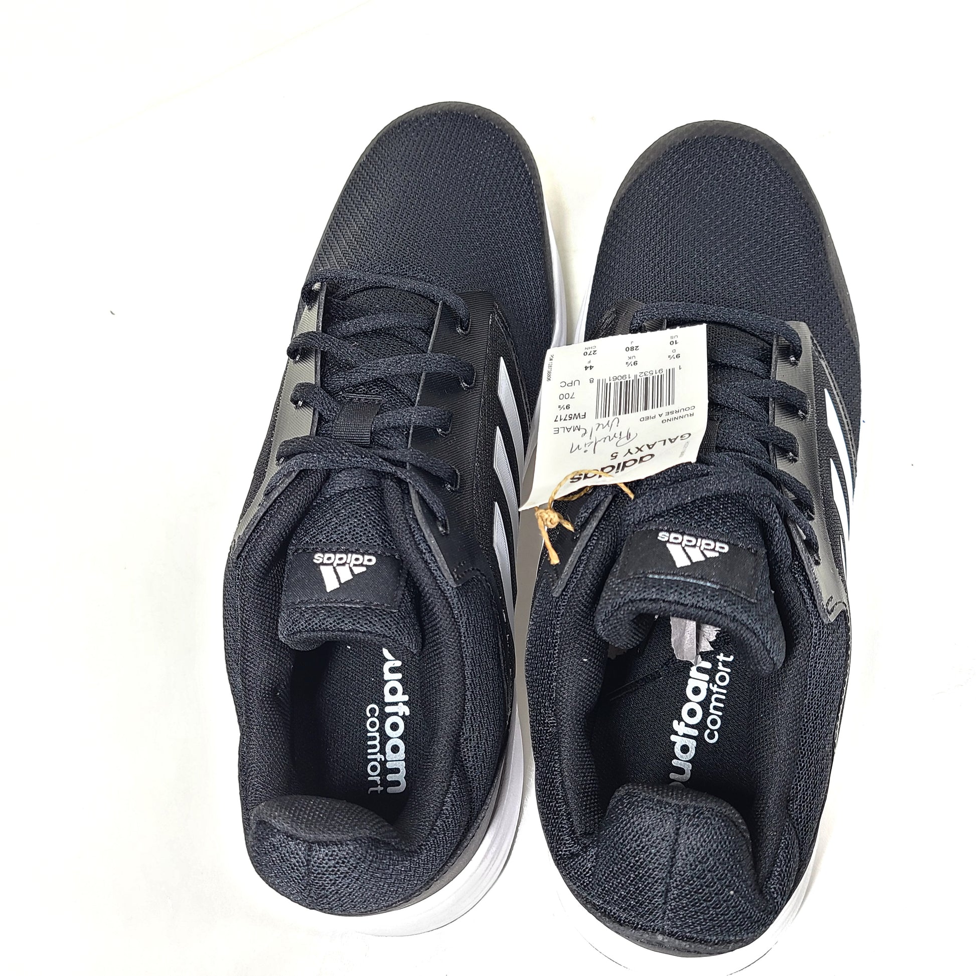 Adidas Galaxy 5 running shoe in black and white, US size 10, designed for everyday training and comfort.