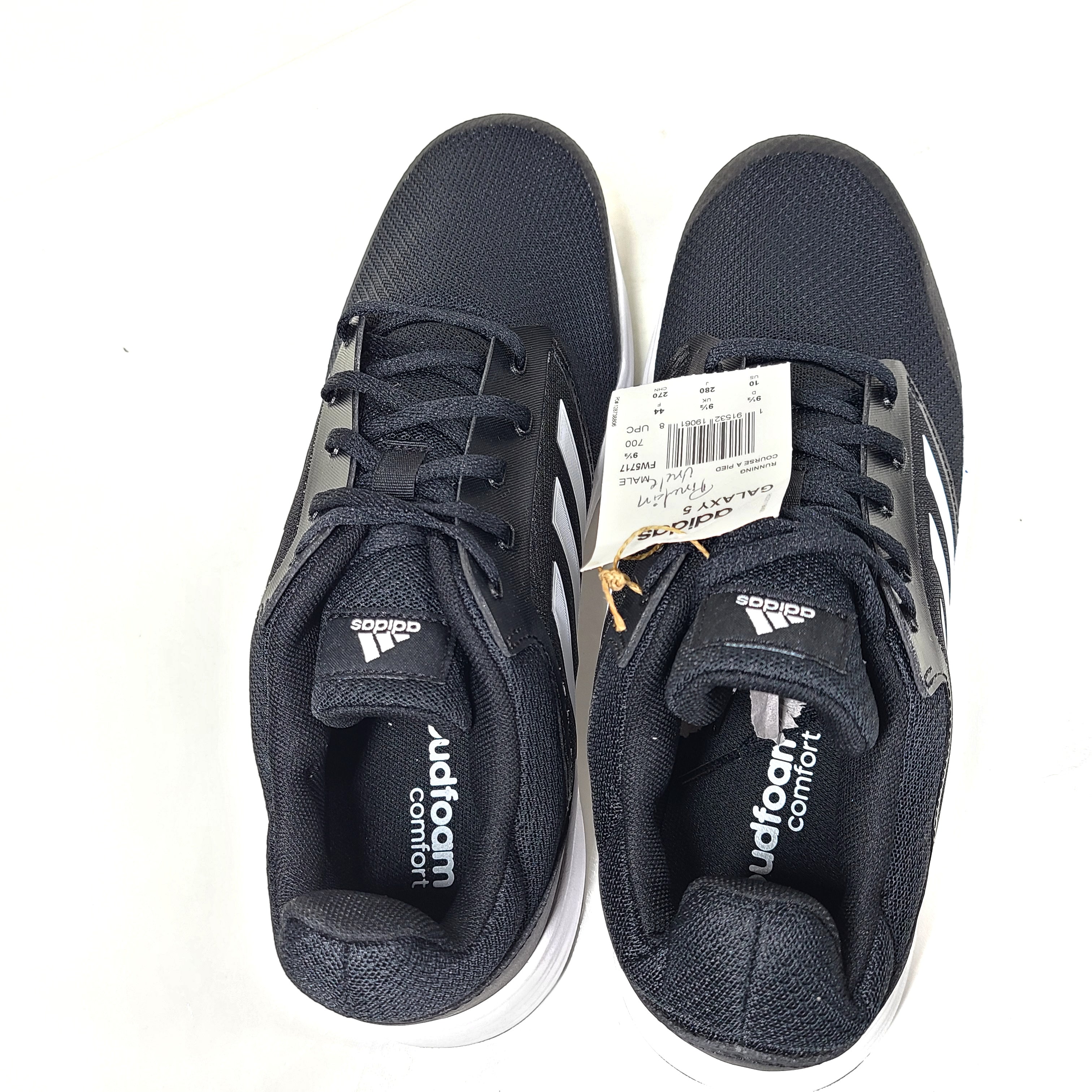 Adidas Galaxy 5 running shoe in black and white, US size 10, designed for everyday training and comfort.